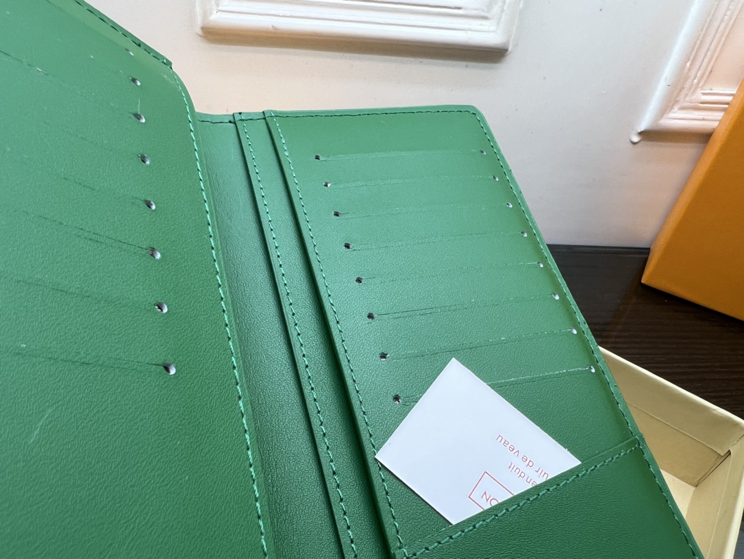 Leather bifold wallet on a table