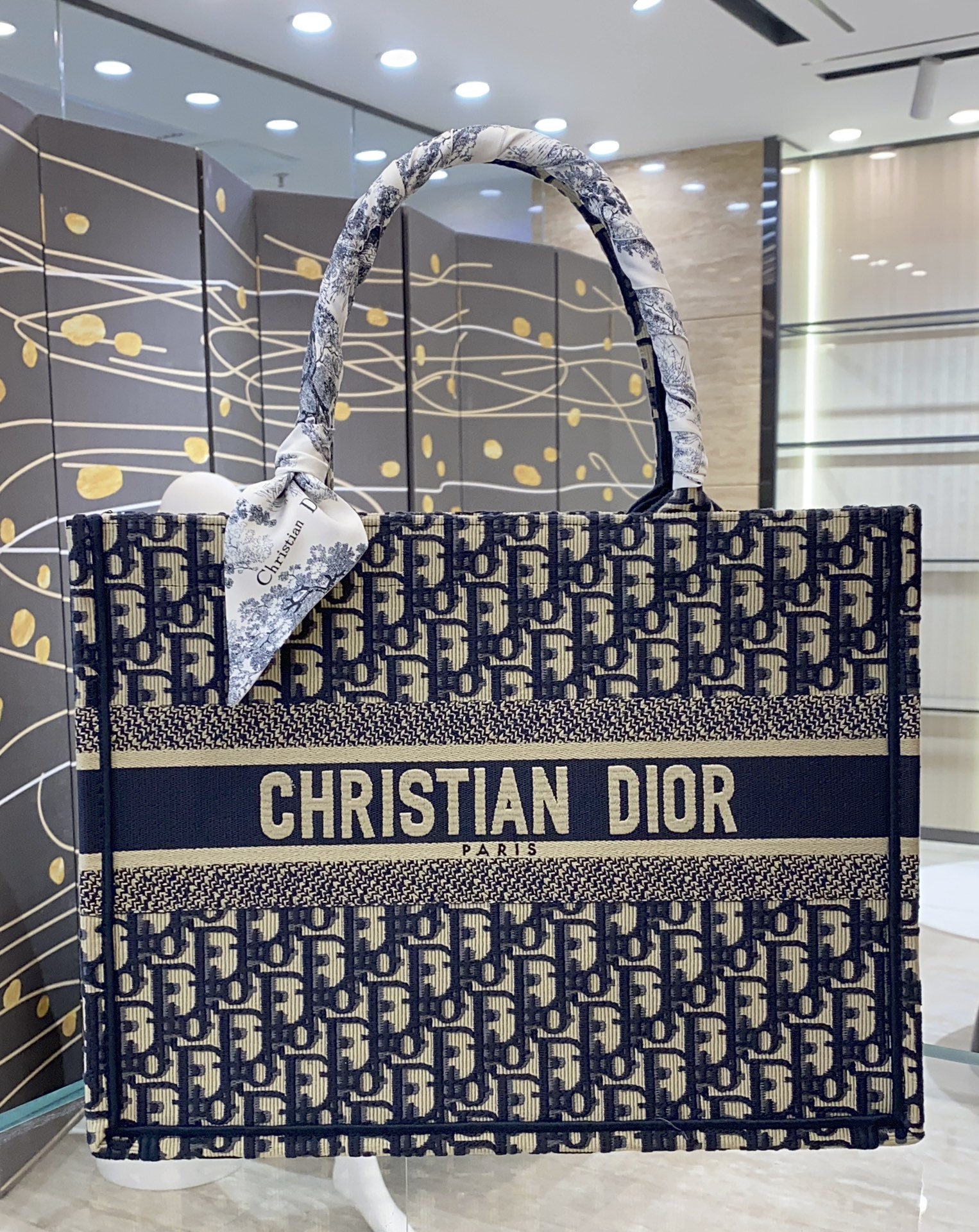 Where should I buy to receive
 Dior Book Tote Tote Bags Blue Gold Yellow