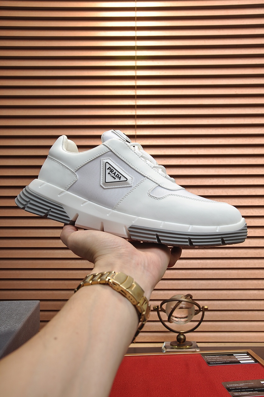 L5  Prada 普拉达 原单减震厚底潮牌主推爆款,前卫百搭时尚男鞋私版开模,飞织鞋面滴胶工艺拼接1：1复刻..时尚干脆、原版进口牛皮垫脚；大气个性更潮更抢眼更追求档次,它将颠覆旧念,与您共度时尚潮人必备! 必自留 ! 高大上的舒适大低,高端品质做工.码数：38-4545定做