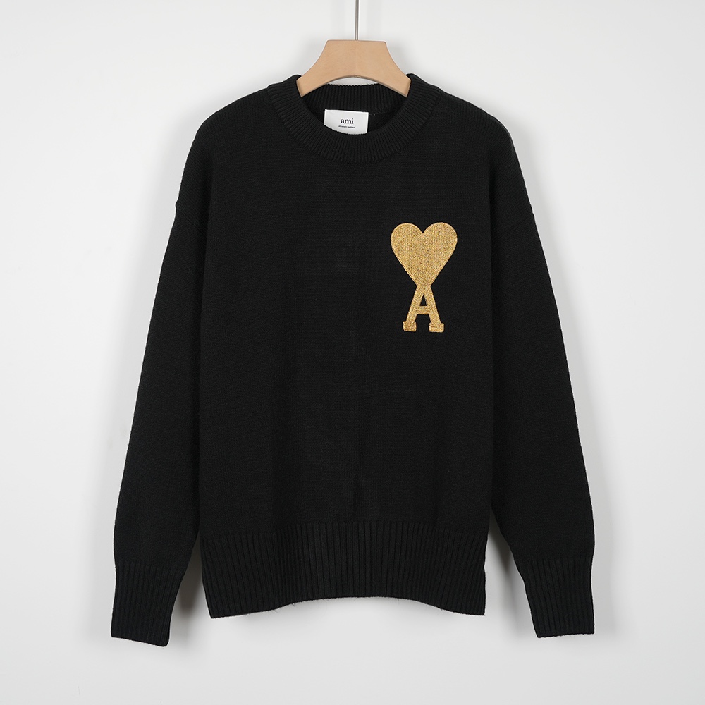 High-End Women’s Clothing: Ami’s Oversize Wool Knits with Twilight Collars