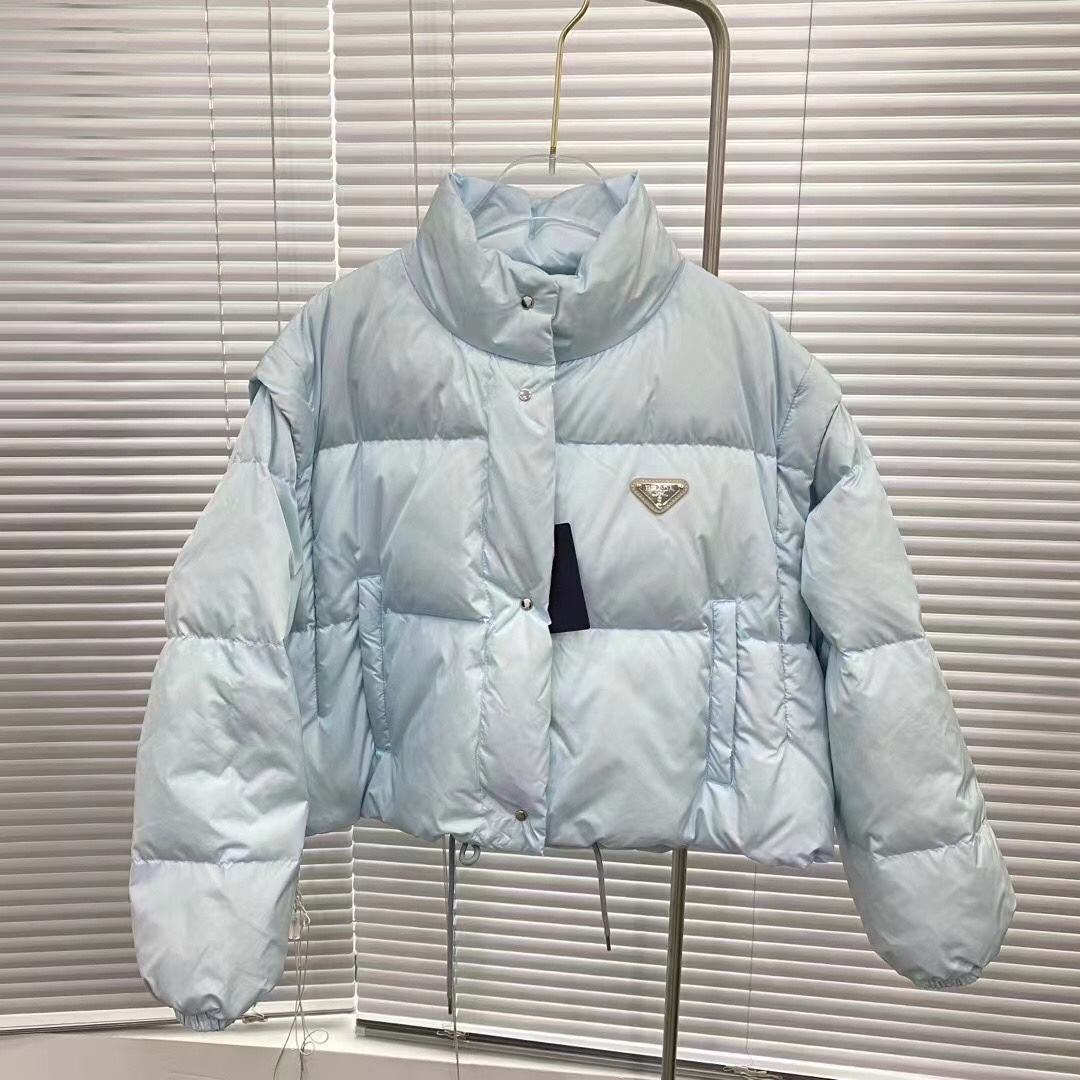 Guangzhou high-version Prada detachable sleeve down jacket. Sizes: S, M, L. Colors: black, blue, white, pink.-Big cat