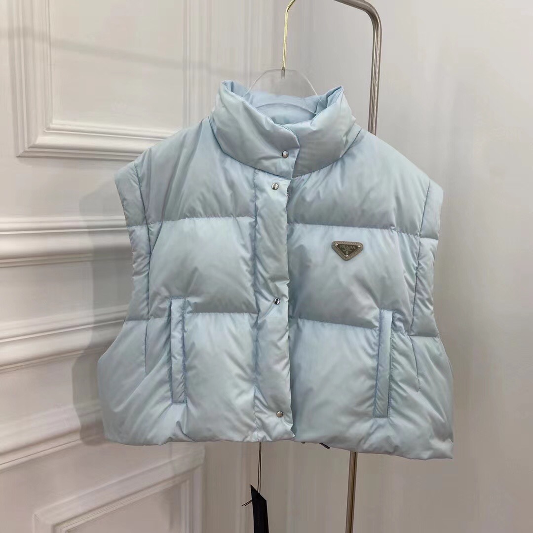 Guangzhou high-version Prada detachable sleeve down jacket. Sizes: S, M, L. Colors: black, blue, white, pink.-Big cat