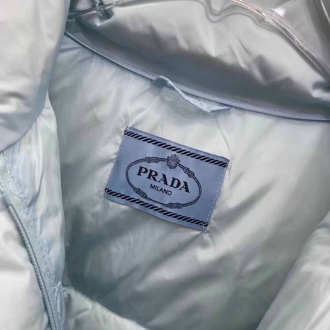 Guangzhou high-version Prada detachable sleeve down jacket. Sizes: S, M, L. Colors: black, blue, white, pink.-Big cat