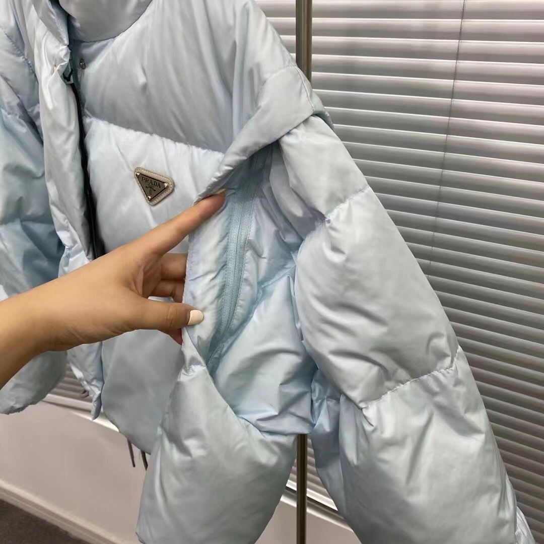 Guangzhou high-version Prada detachable sleeve down jacket. Sizes: S, M, L. Colors: black, blue, white, pink.-Big cat