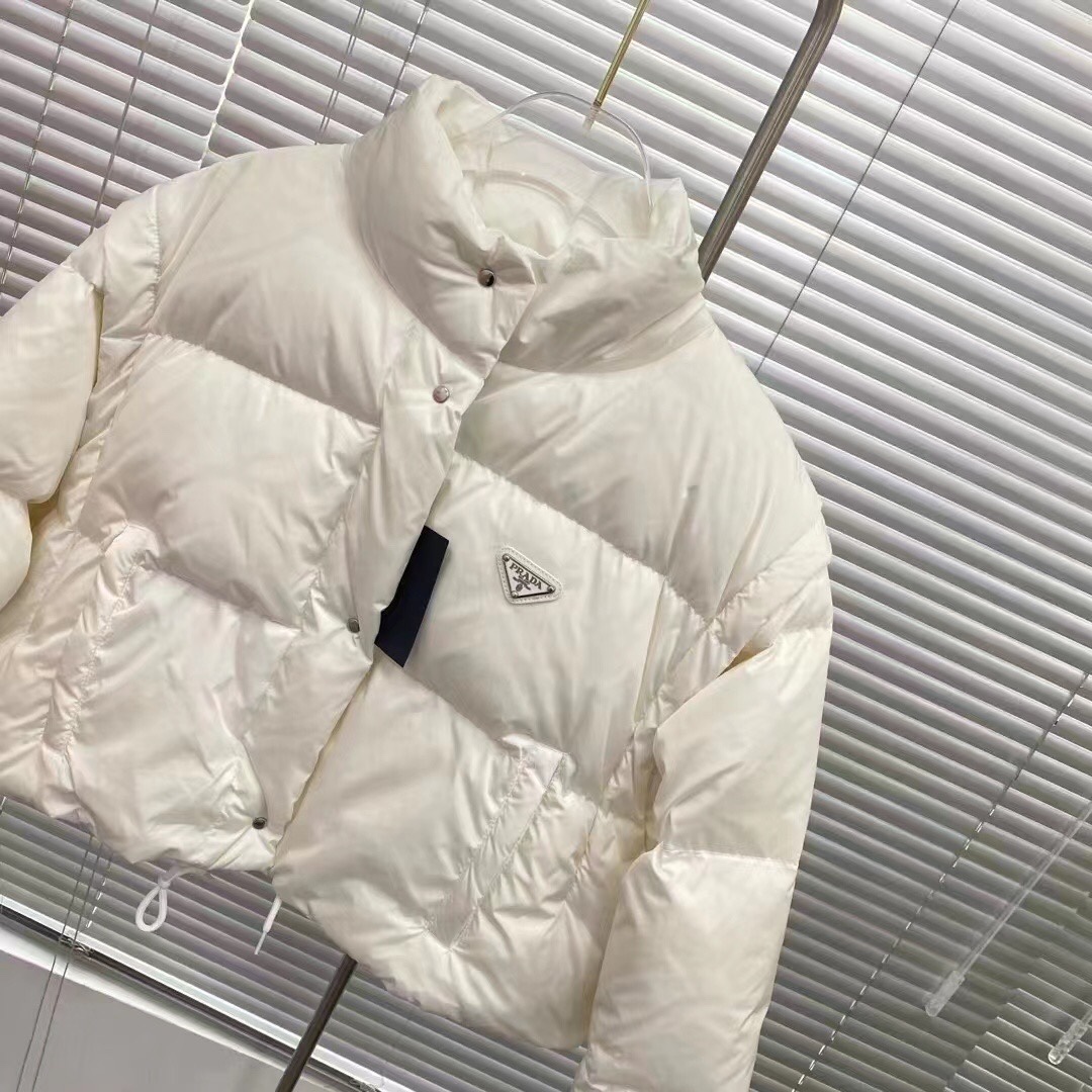 Guangzhou high-end Prada detachable sleeve down jacket. Sizes: S, M, L. Colors: black, blue, white, pink.-Big cat