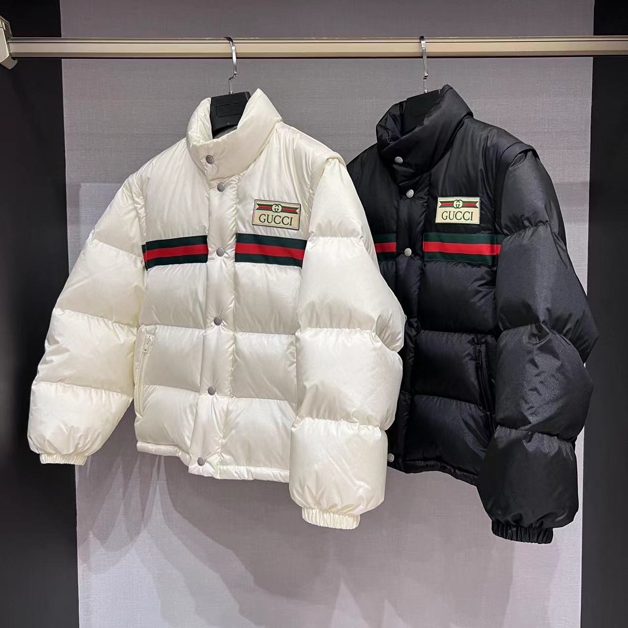 GUCCI striped nylon quilted pilot jacket with 90% white goose down fill. Detachable sleeves, unisex. Colors: white, black. Sizes: 36-42.-Big cat