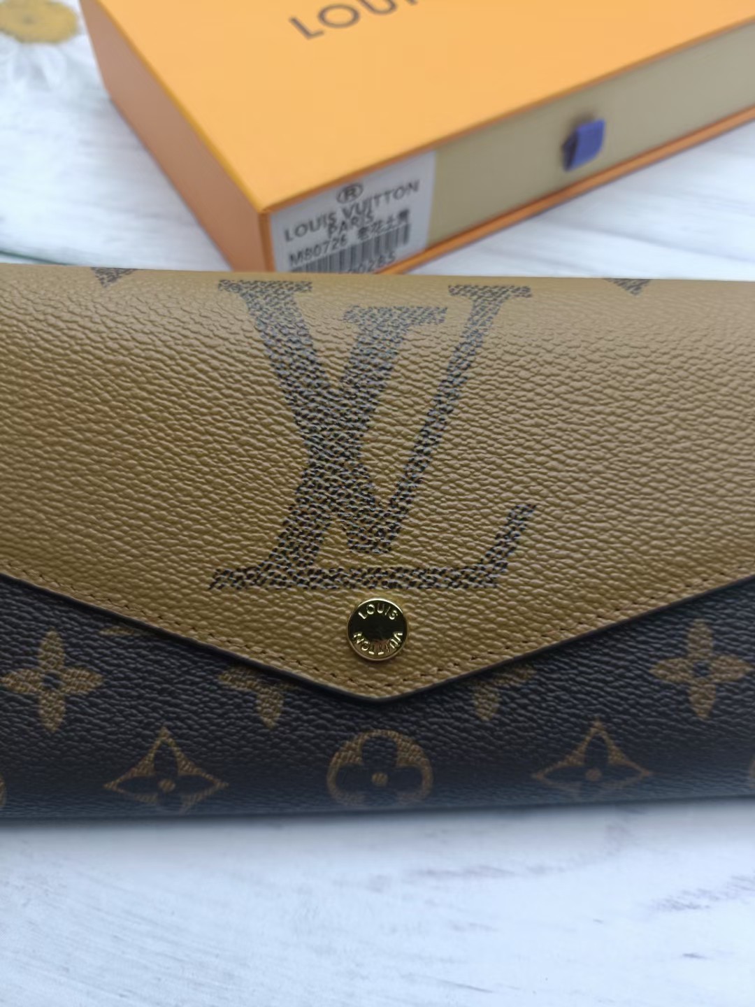 Close up view of leather texture of the zip-around wallet