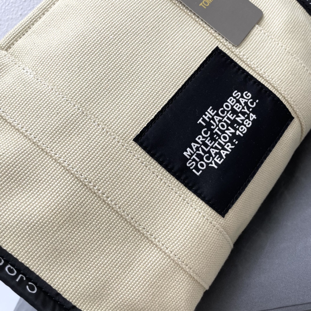 Marc Jacobs The Traveler Small Tote Bag, Canvas with Zip Closure 6 i1665243495 2173 4