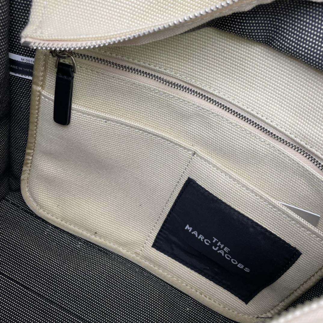 Marc Jacobs The Traveler Small Tote Bag, Canvas with Zip Closure 10 i1665243495 6031 8