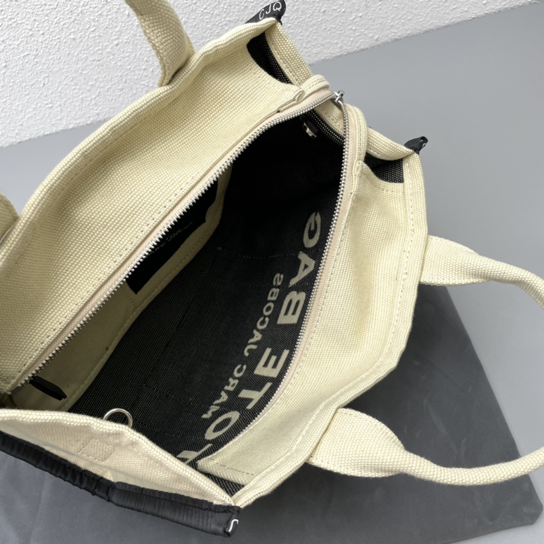 Marc Jacobs The Traveler Small Tote Bag, Canvas with Zip Closure 9 i1665243495 8932 7