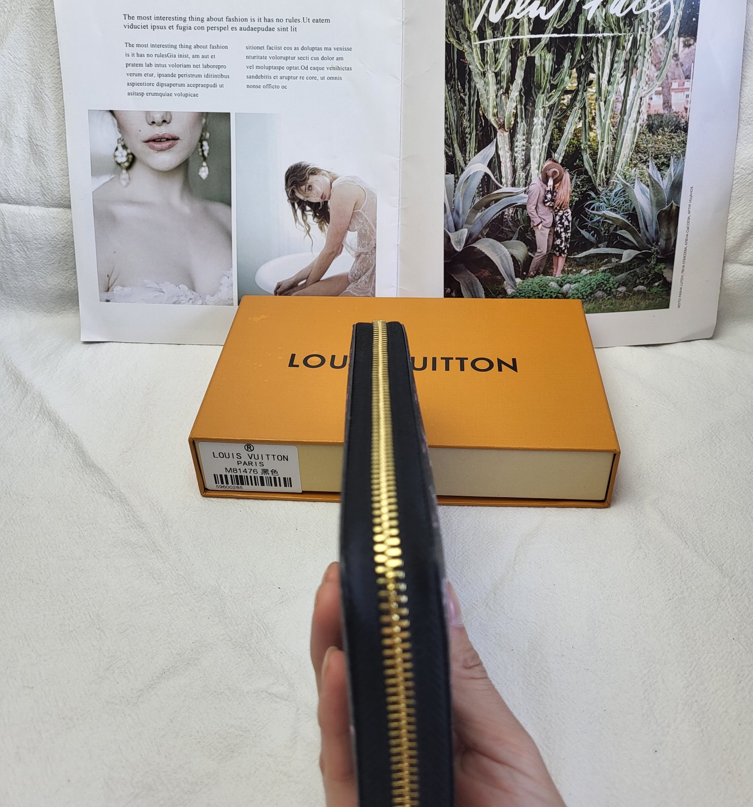 Close-up of the handcrafted stitching on the leather wallet.