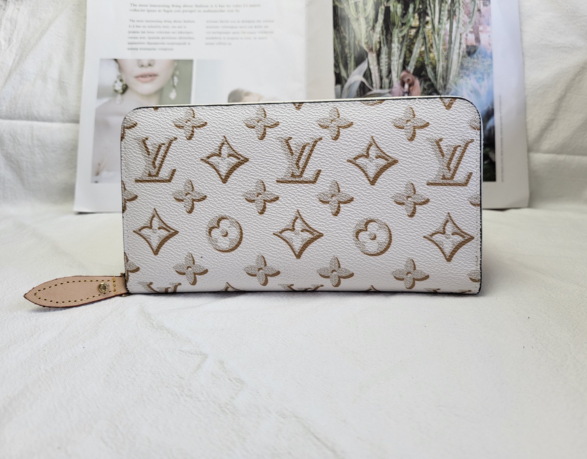 A person holding the elegant leather long wallet.