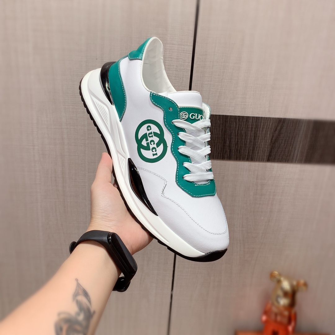 I5  Gucci  古奇   最新爆款休闲鞋，顶端品牌奢侈～代购，顶级～质量。专柜同卖产品鞋面選用进口透气牛皮搭配材质透气羊皮内里精细做工。原版个性时尚柔软橡膠耐磨防滑大底，上脚轻巧舒适，实物拍摄實物更好看，003广州码: 38-44。可定制45码。2色可选