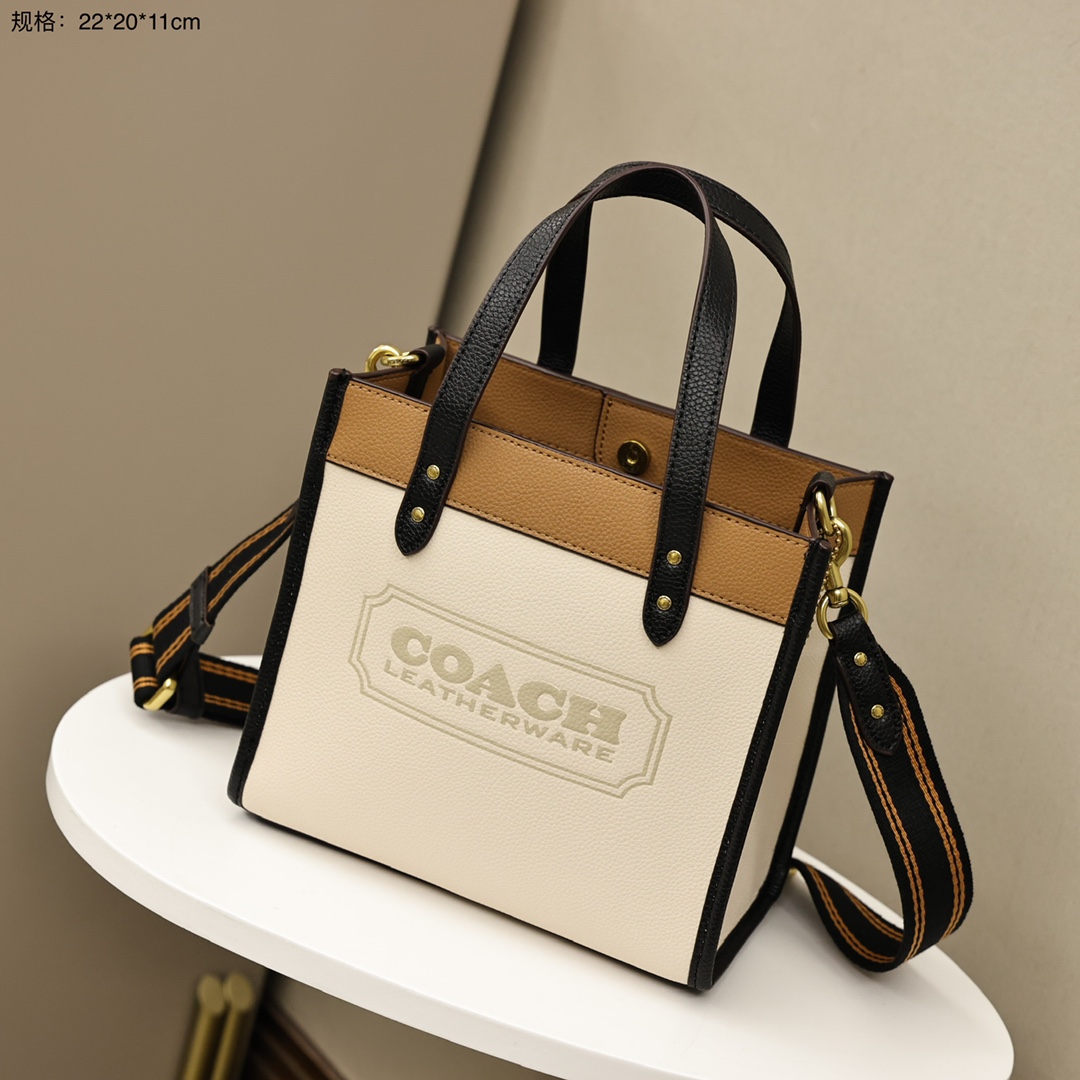 蔻驰Dempsey22托特包💰220 顶级原单/细节完美 材质是头层牛皮,出门拎在手上非常的轻便,颜色极具清新氛围,实用与美观兼具的包包。 规格:22*20*11cm