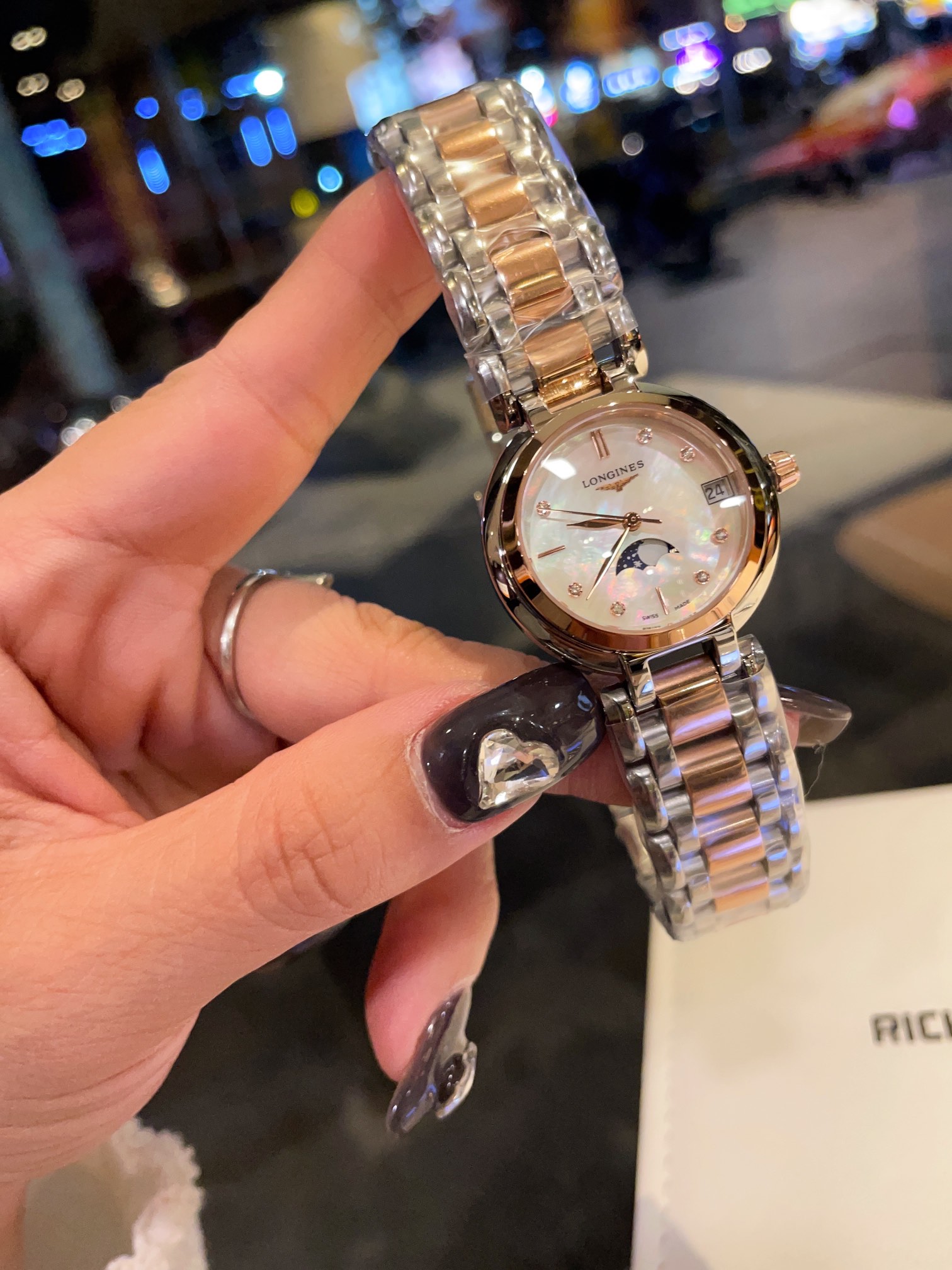 Longines Elegant Collection Moonphase silver stainless steel case, bezel, dial, and bracelet 30mm Women's Quartz