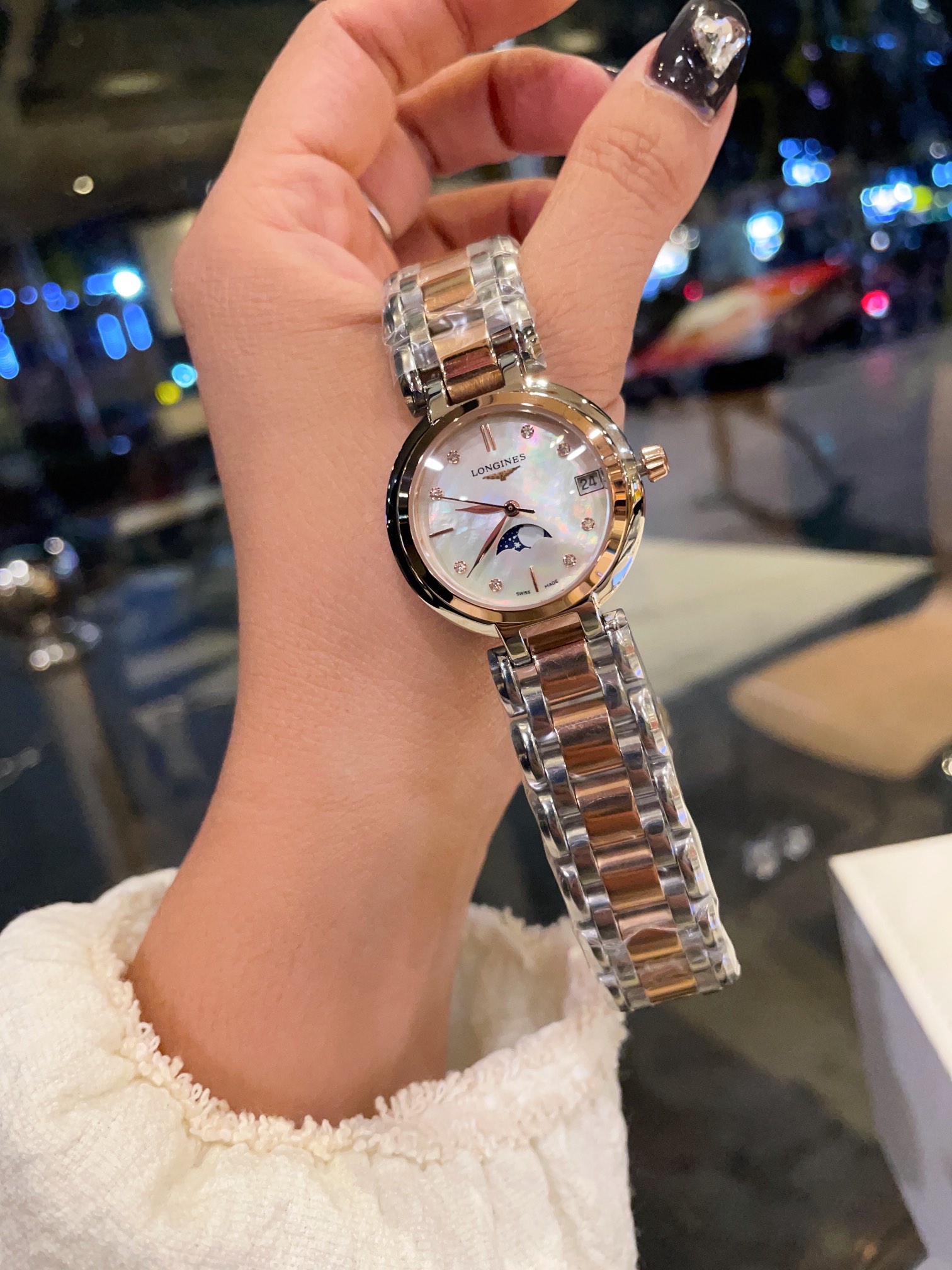 Longines Elegant Collection Moonphase silver stainless steel case, bezel, dial, and bracelet 30mm Women's Quartz