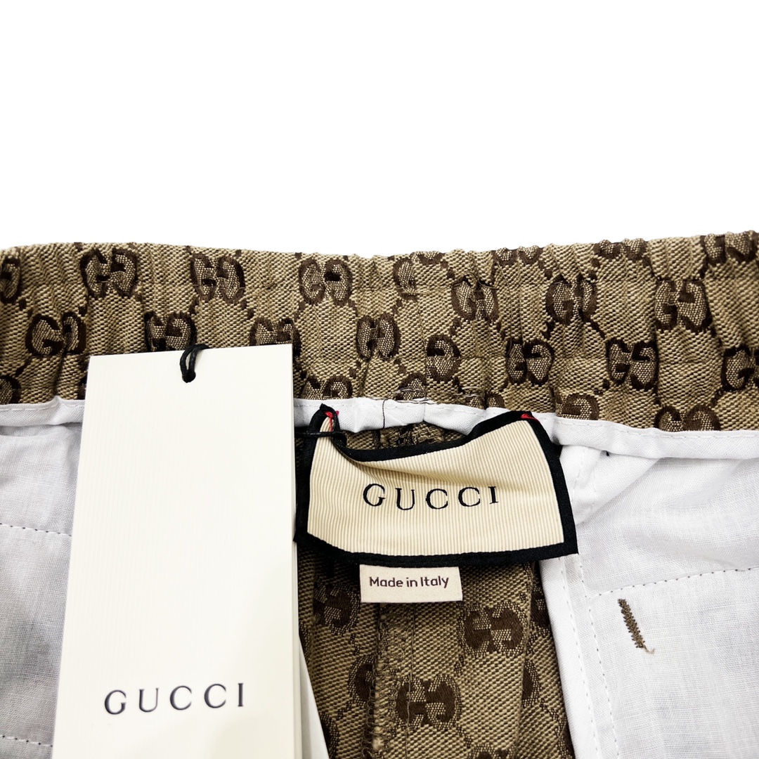 GUCCI/古驰 22FW复古棕色满印提花长裤