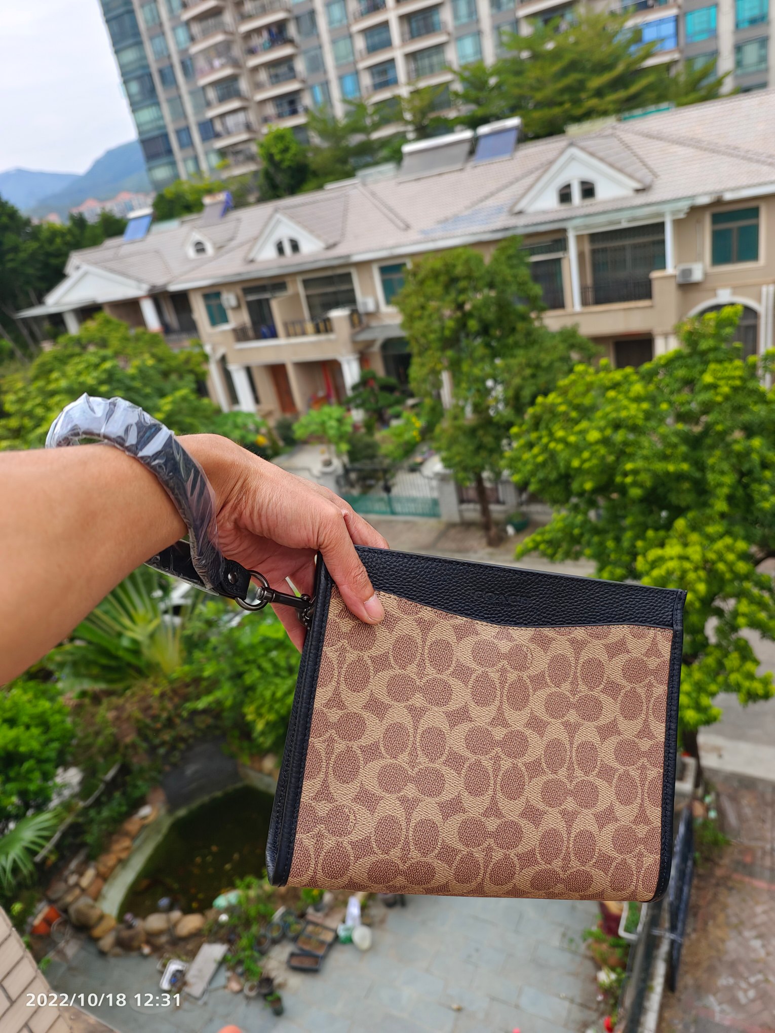 Coach cc088 Coach马车标志印花牛皮HITCH男手拿斜挎包 一包多用 斜挎包 可手抓包