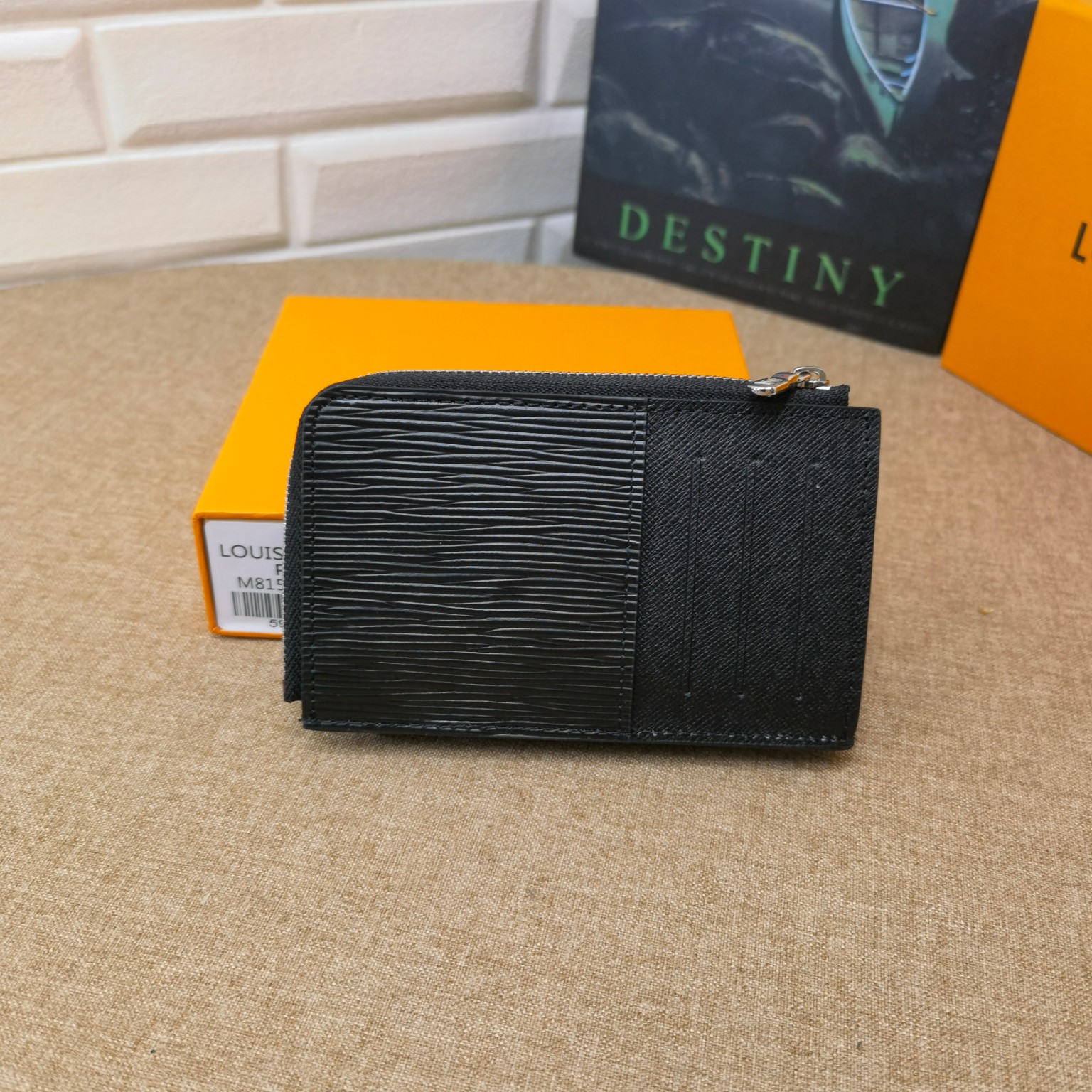 Close-up of black leather texture on card holder