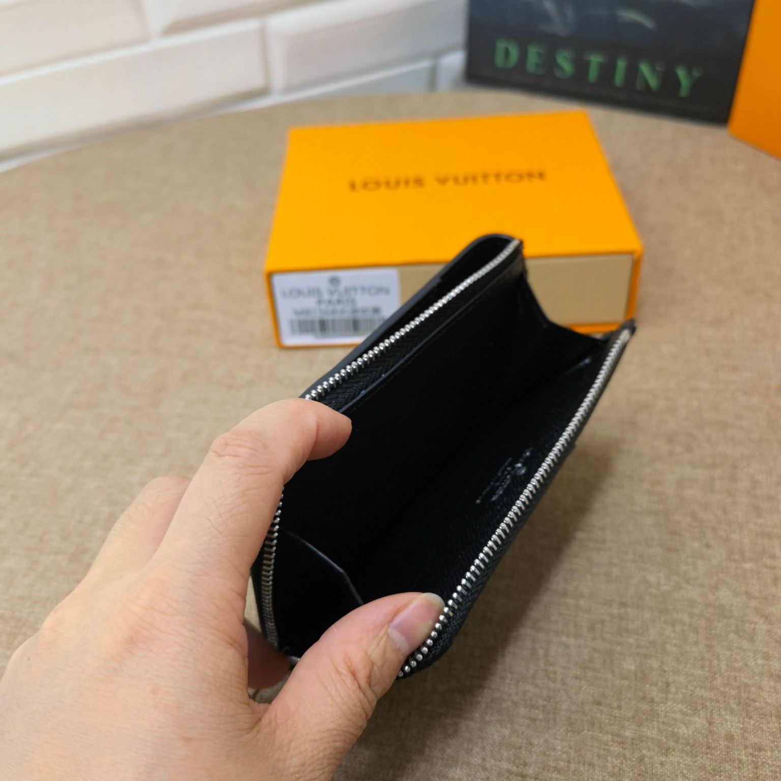 Back view of black leather card holder