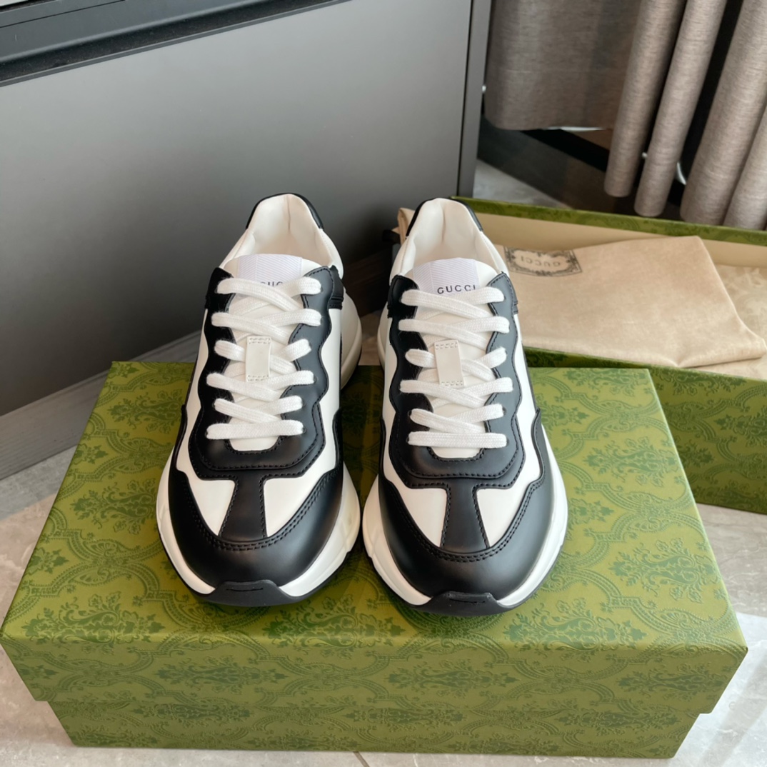 GUCCI sneakers chunky noir et blanc en cuir à lacets