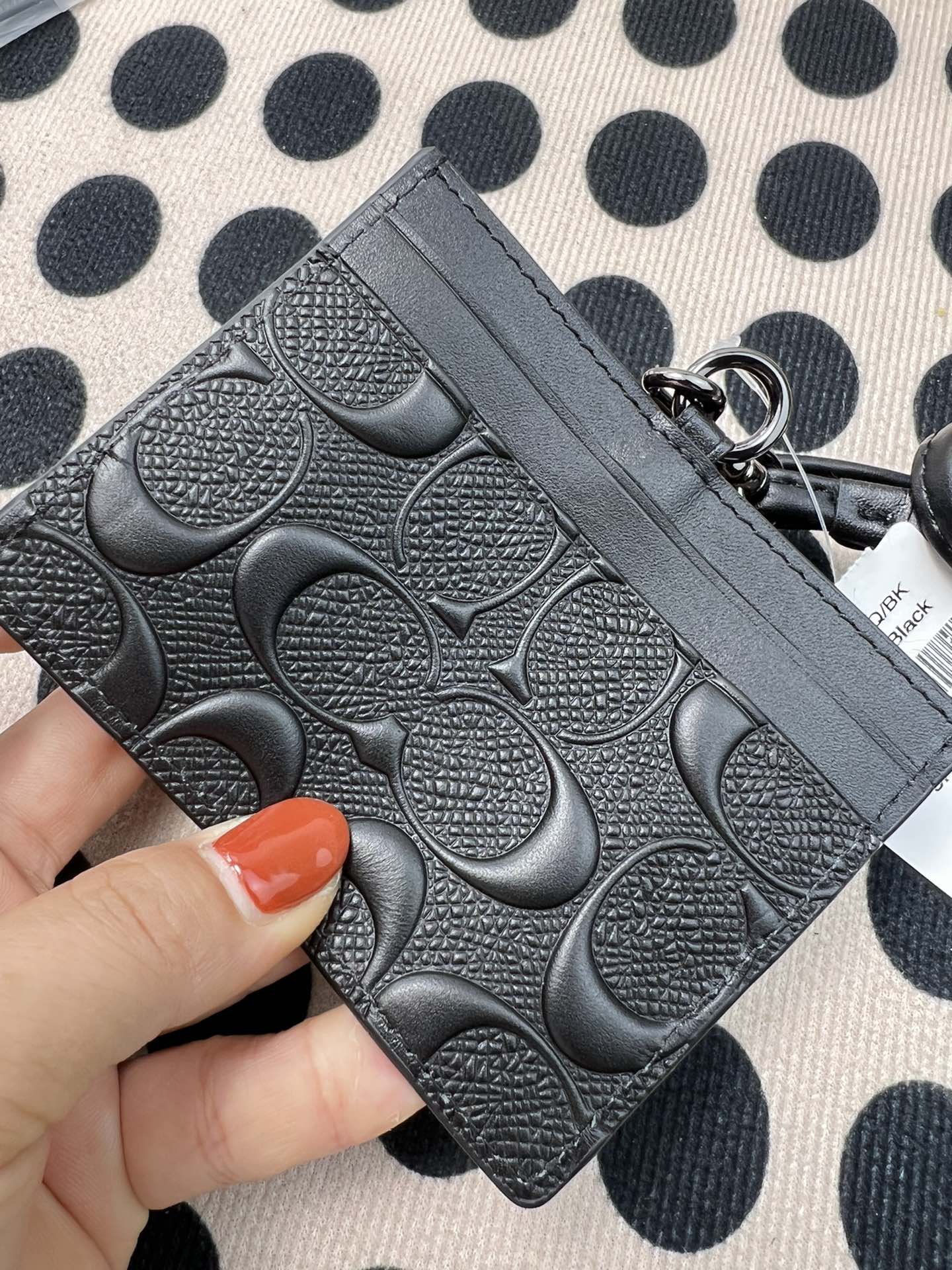 Coach ～coach F6752头成牛皮压纹黑色、横款方形工作牌