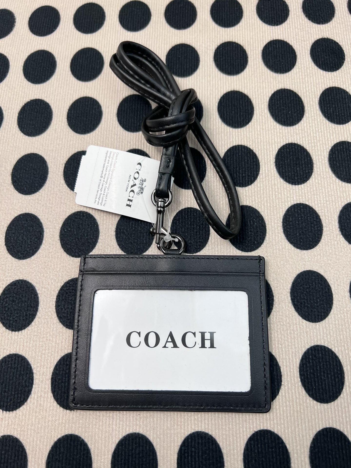 Coach ～coach F6752头成牛皮压纹黑色、横款方形工作牌