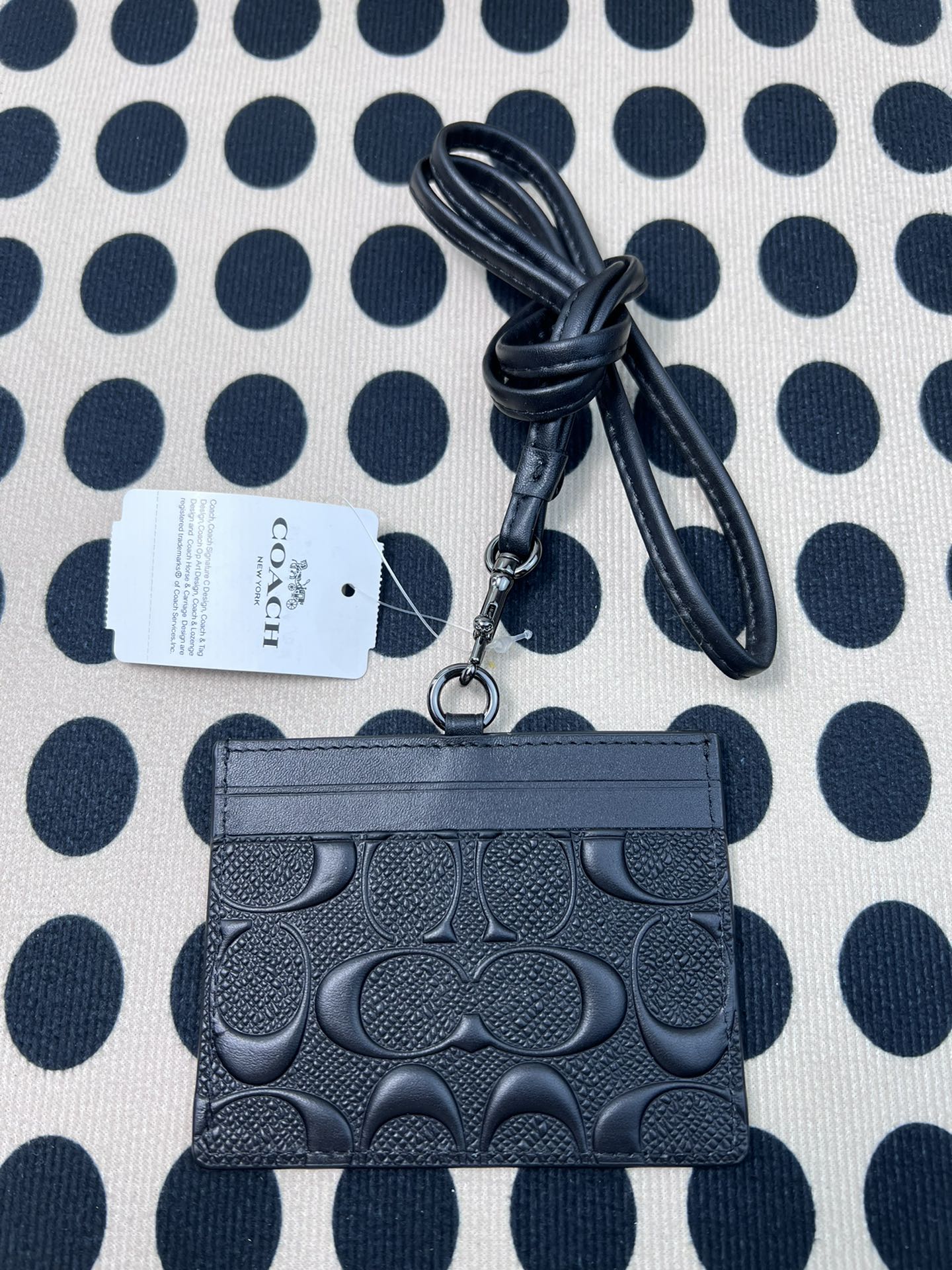Coach ～coach F6752头成牛皮压纹黑色、横款方形工作牌
