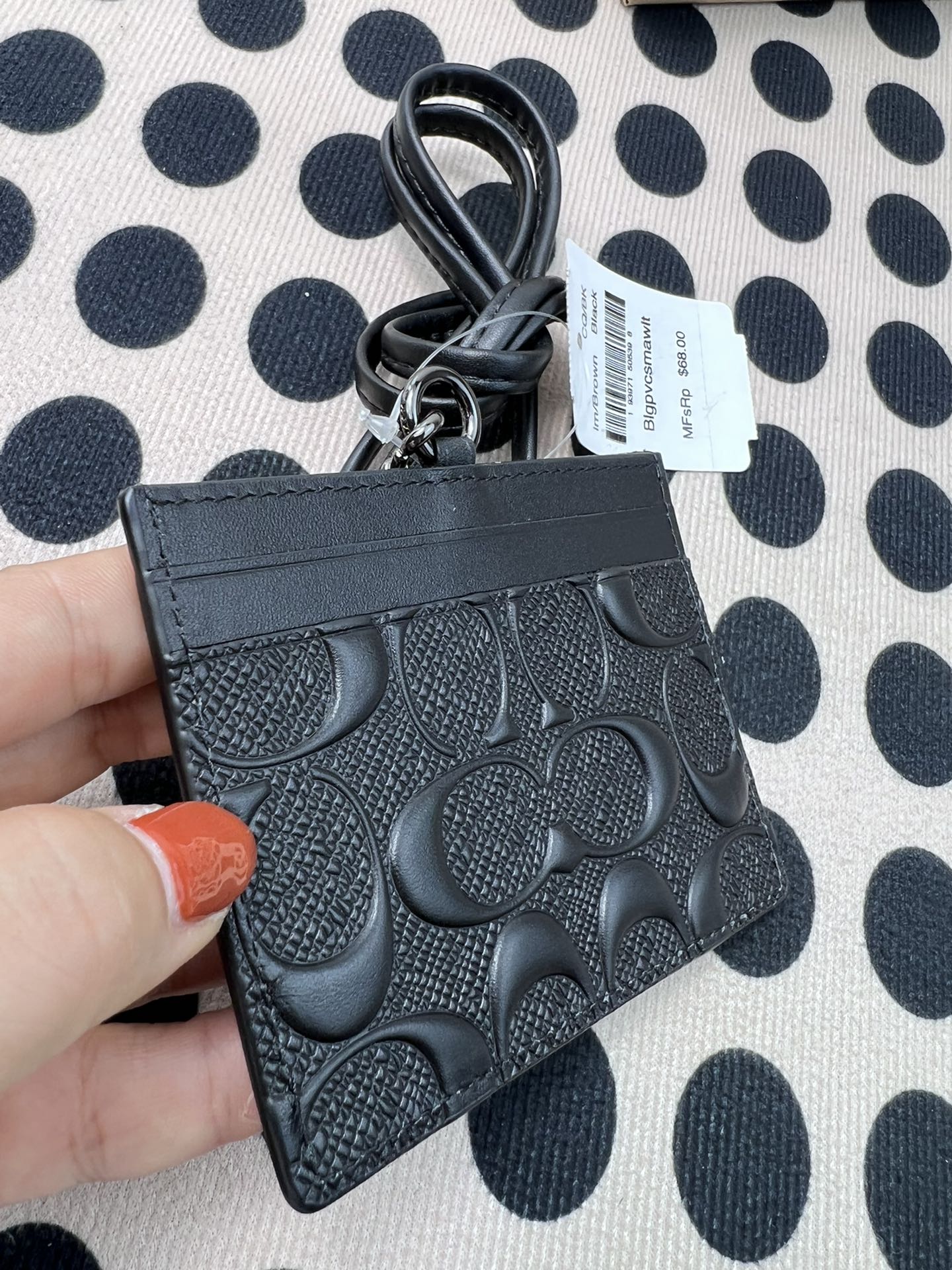 Coach ～coach F6752头成牛皮压纹黑色、横款方形工作牌