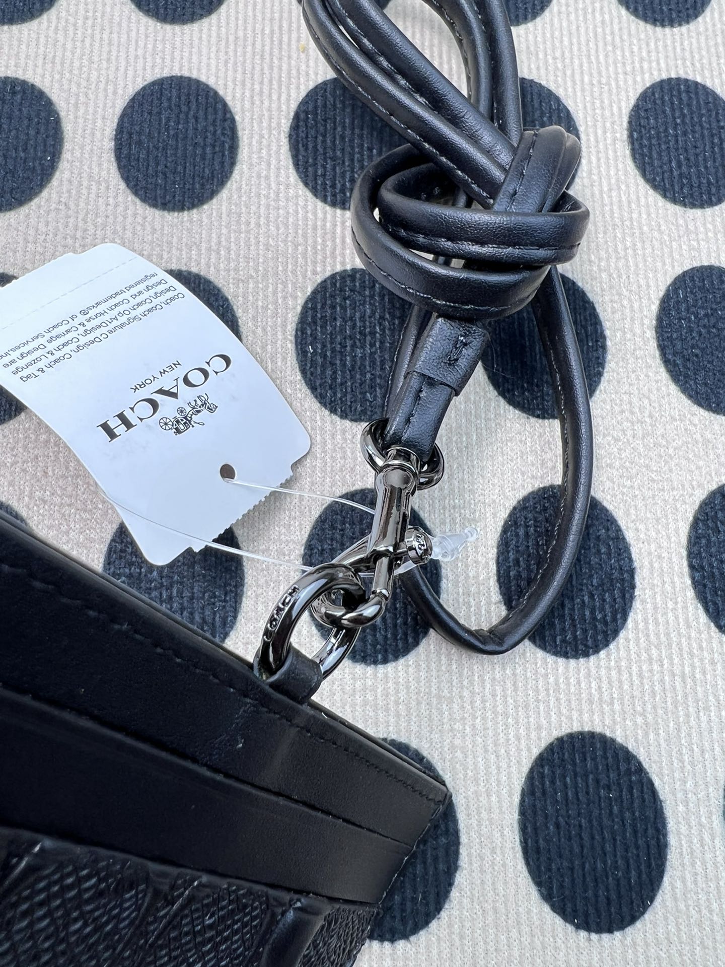 Coach ～coach F6752头成牛皮压纹黑色、横款方形工作牌