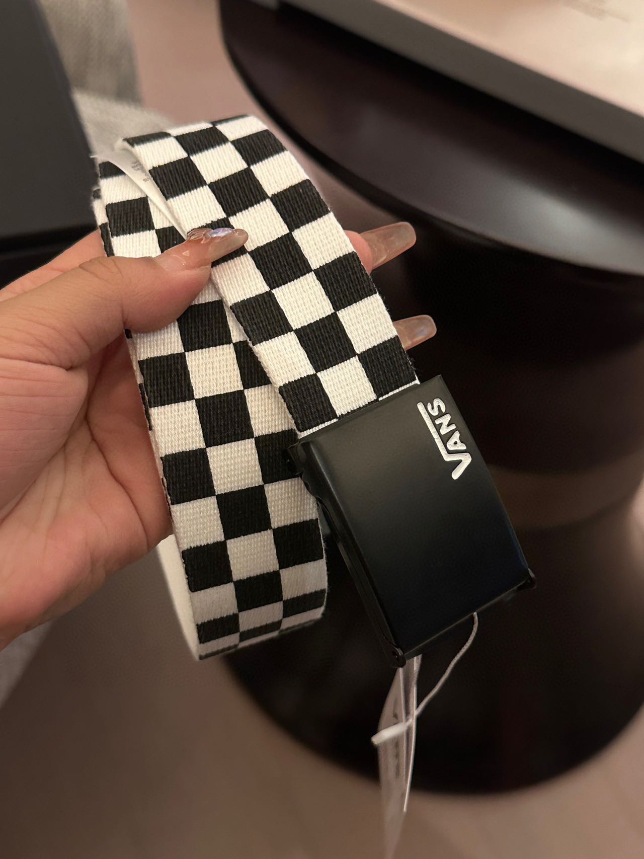 Black and white checkerboard patternBelts are the most common style of - Tie 3