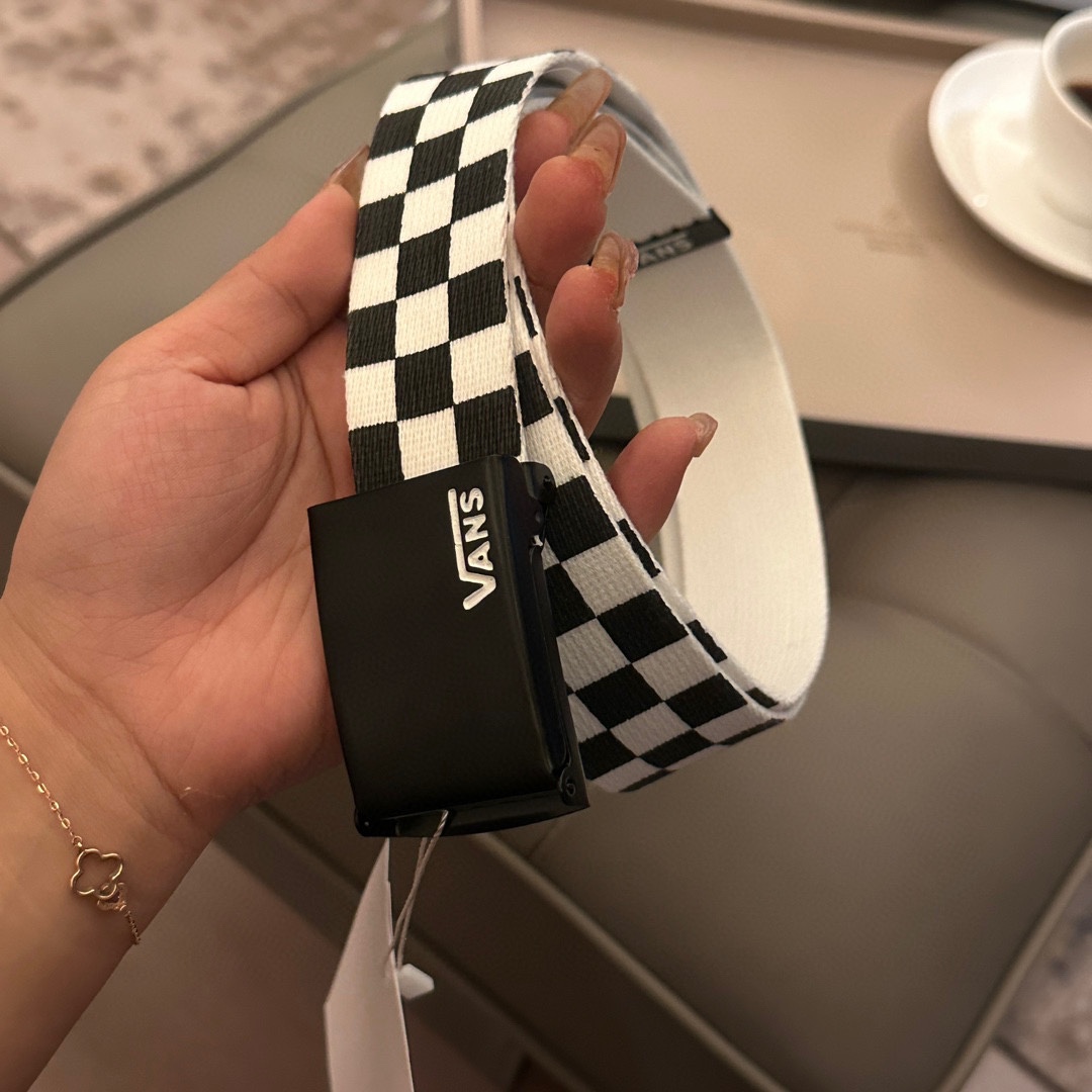 Black and white checkerboard patternBelts are the most common style of - Tie 2