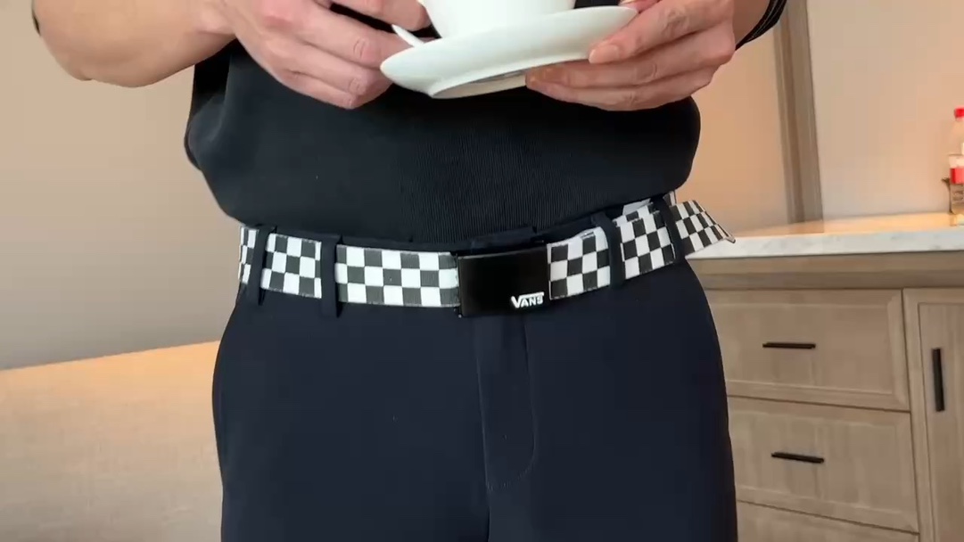 Featuring the timeless checkerboard motif, this belt is designed to - Tie