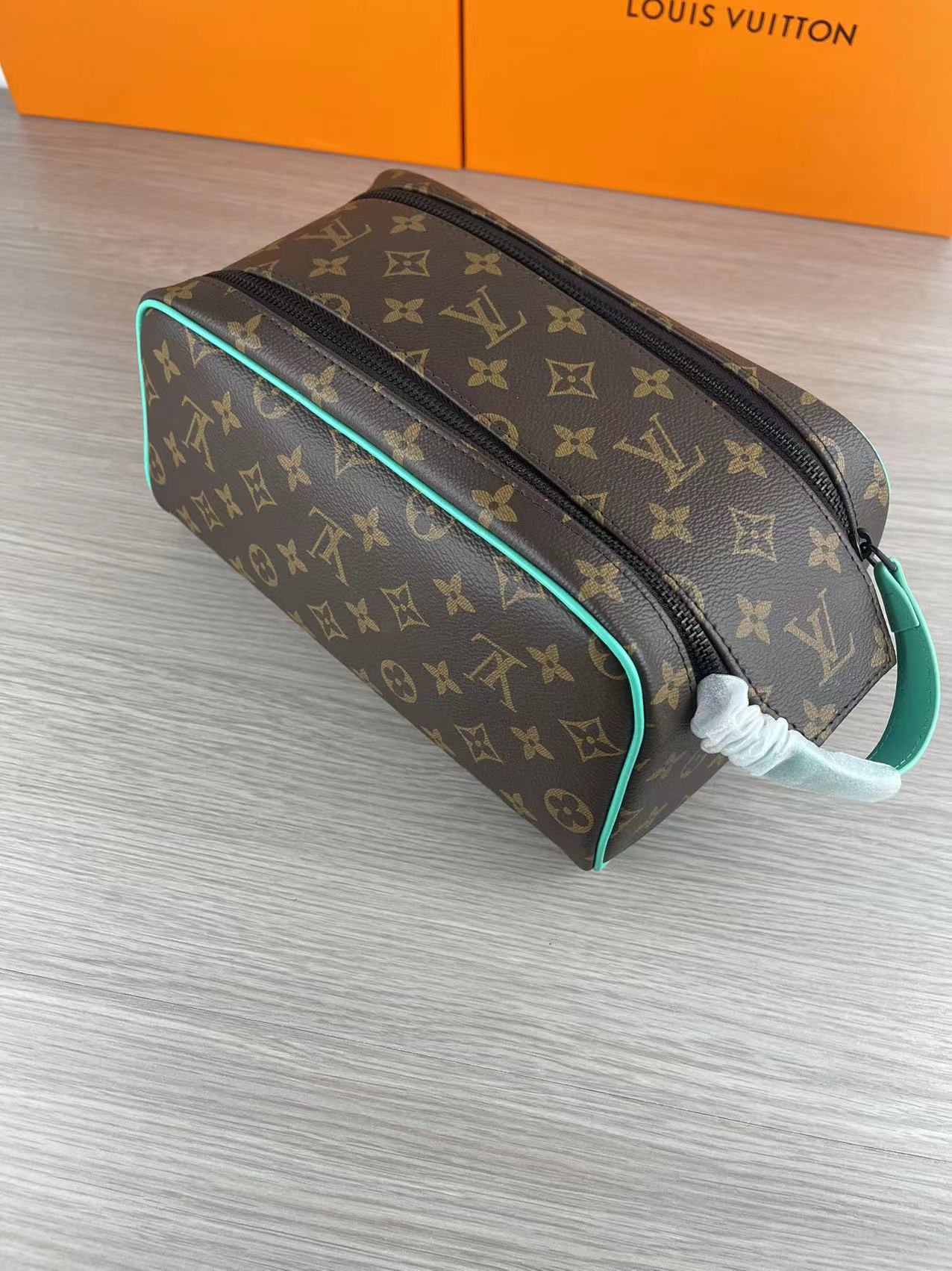 Brown monogram leather wash bag front view