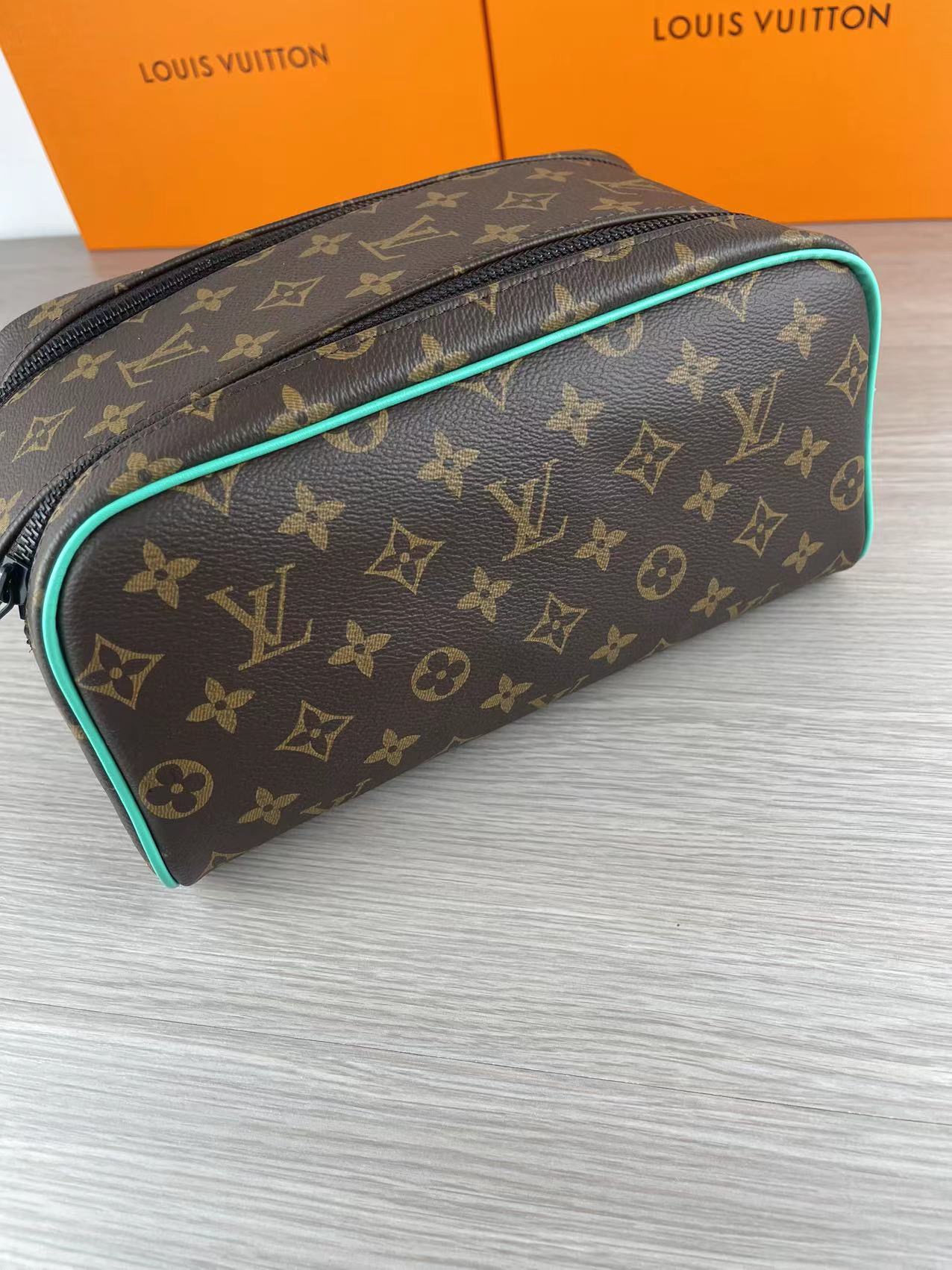 Close-up details of the brown leather wash bag