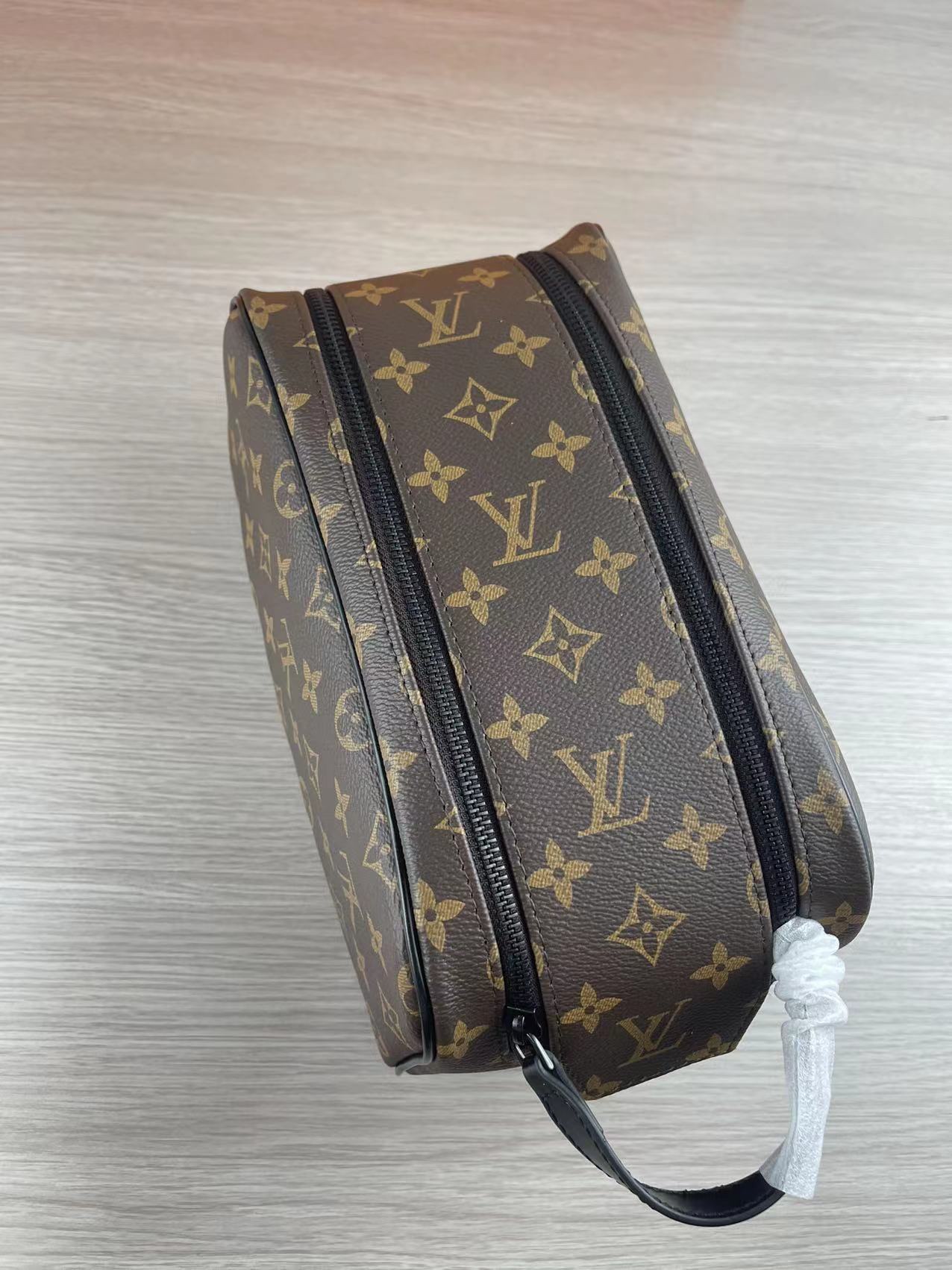 Interior view of the black leather wash bag