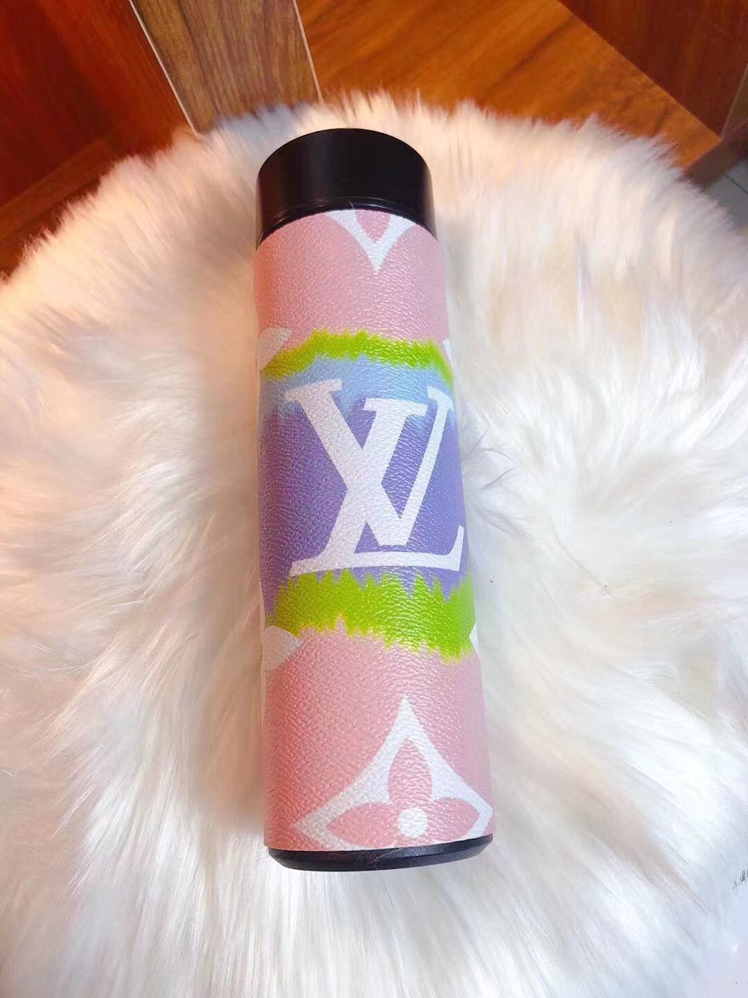 Person using insulated water bottle