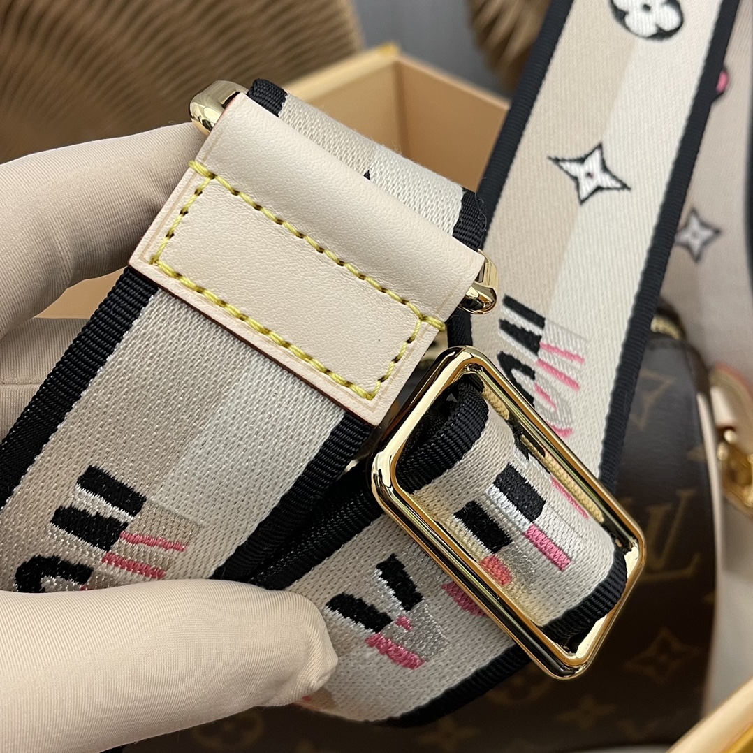 the Speedy Bandoulière 20 handbag captures the classic silhouette of the - Bag 8