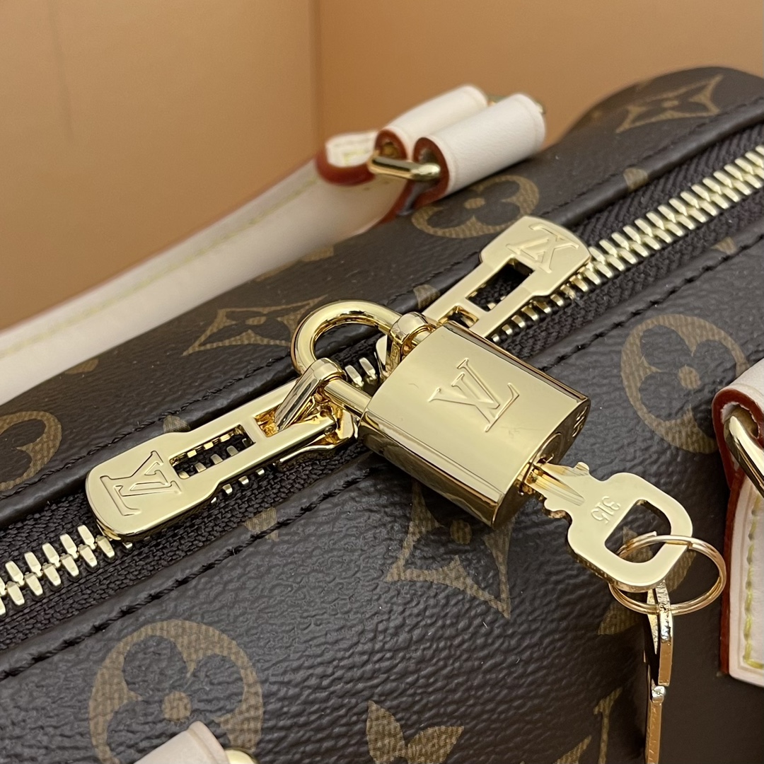 the Speedy Bandoulière 20 handbag captures the classic silhouette of the - Bag 6