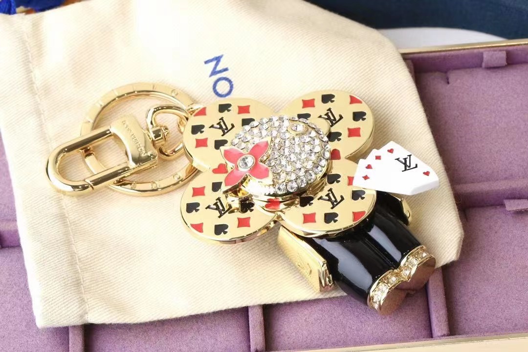 Sunflower keychain attached to a handbag