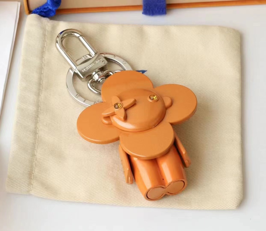 Charming sunflower keychain attached to a bag