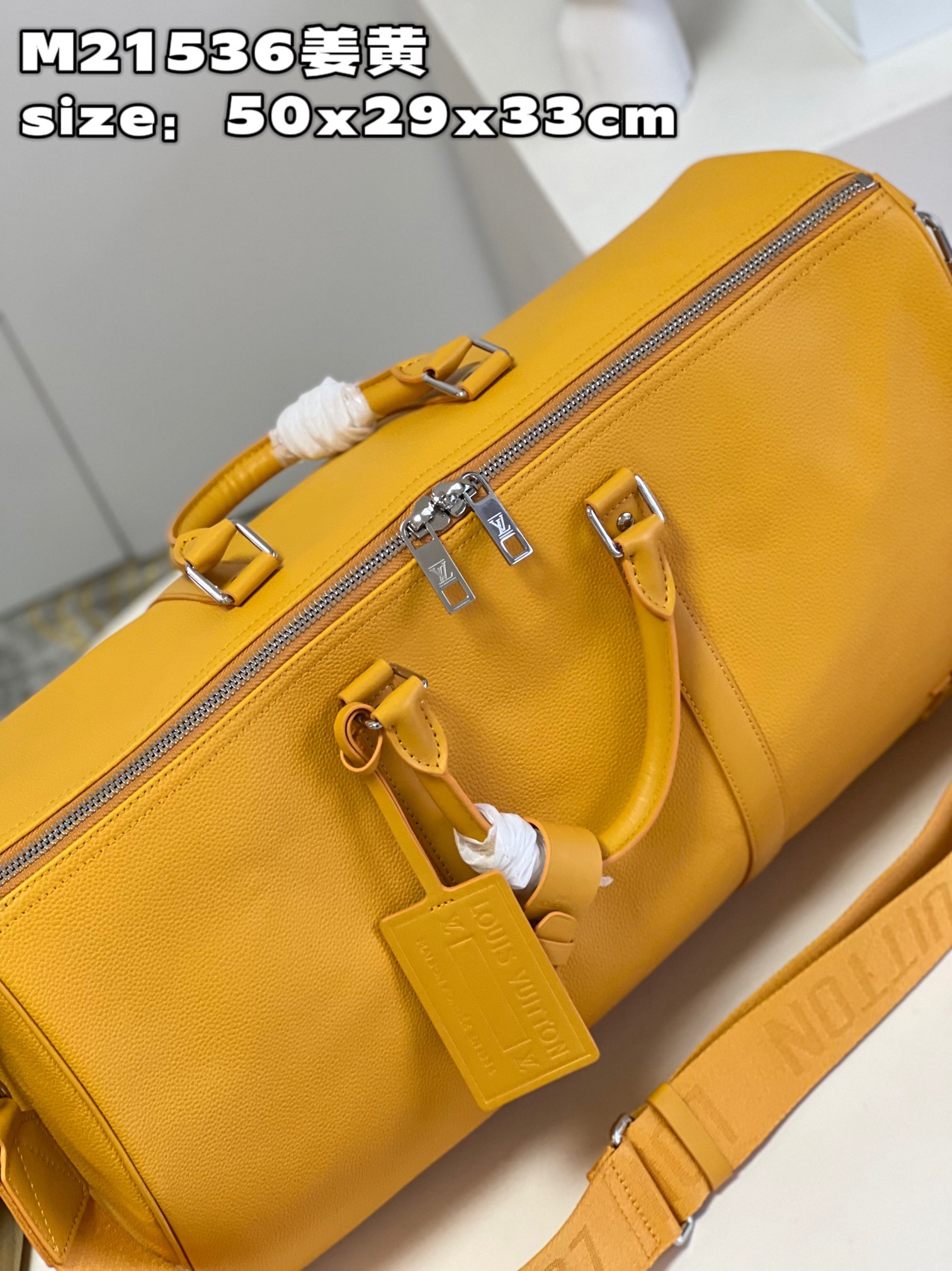 顶级【独家实拍 M21536姜黄】本款 Keepall 旅行袋选用 LV Aerogram 牛皮革塑造经典构型,见证路易威登的精湛皮革匠艺 7