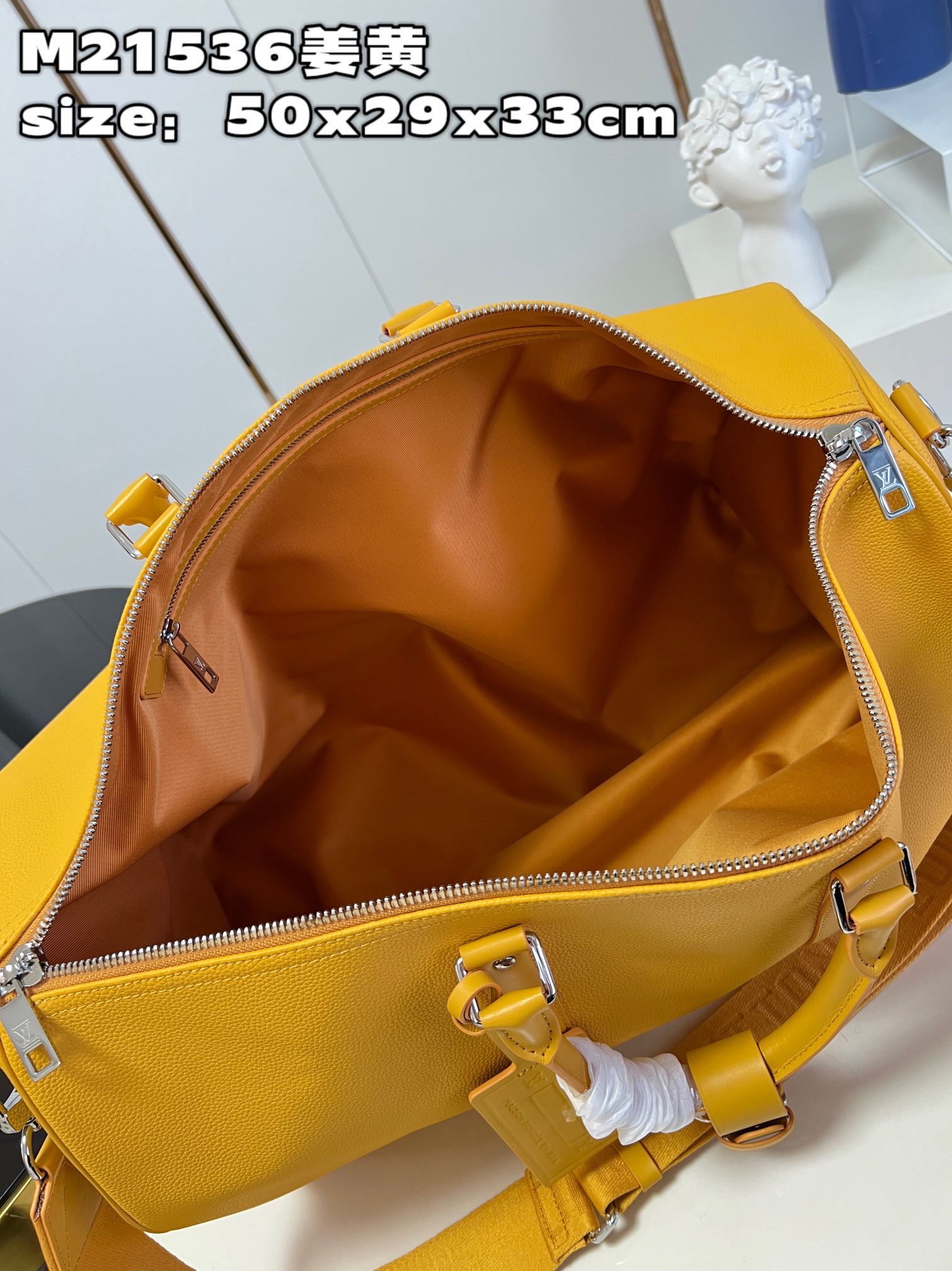 顶级【独家实拍 M21536姜黄】本款 Keepall 旅行袋选用 LV Aerogram 牛皮革塑造经典构型,见证路易威登的精湛皮革匠艺 8