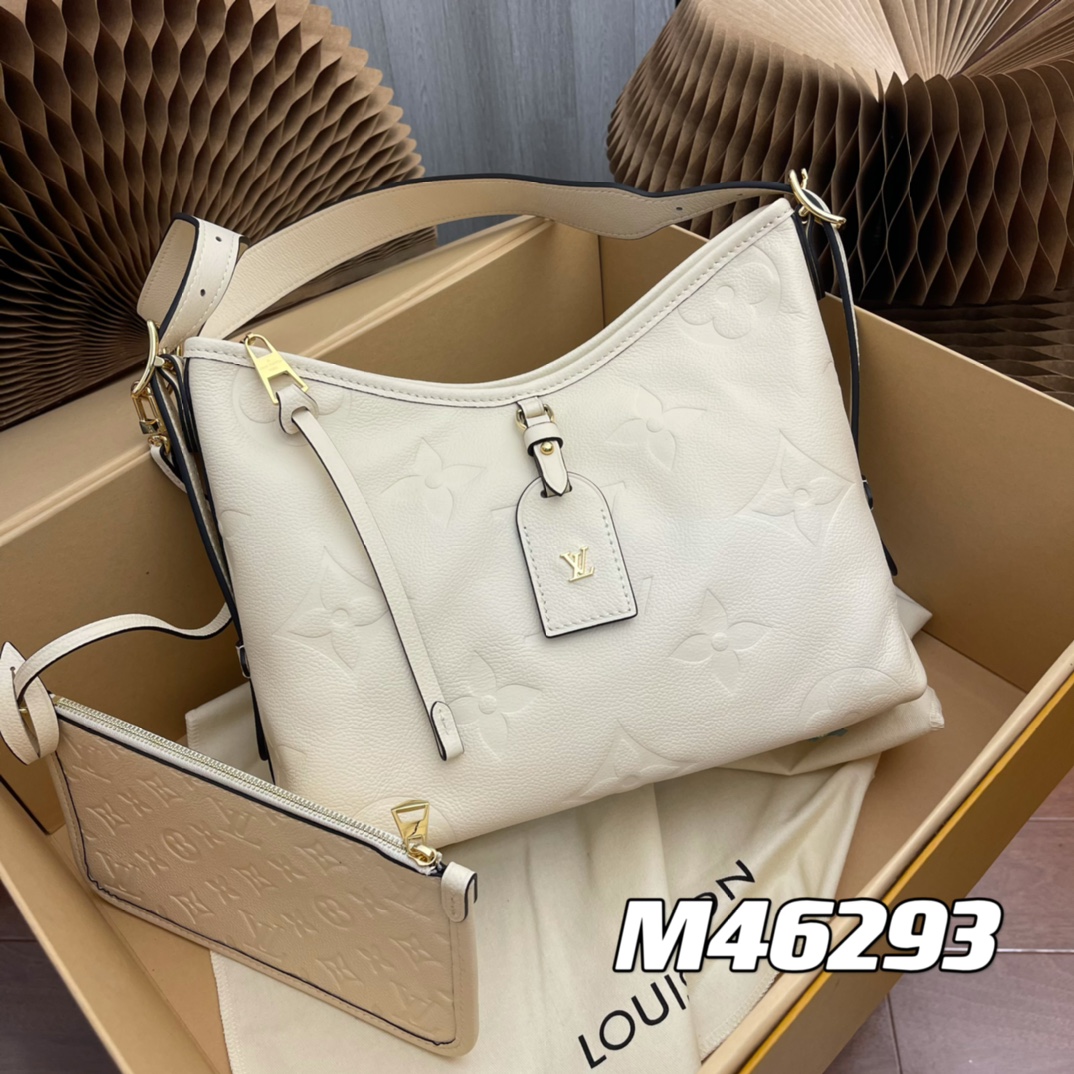 this small handbag features a generous silhouette with a well-organized - Bag