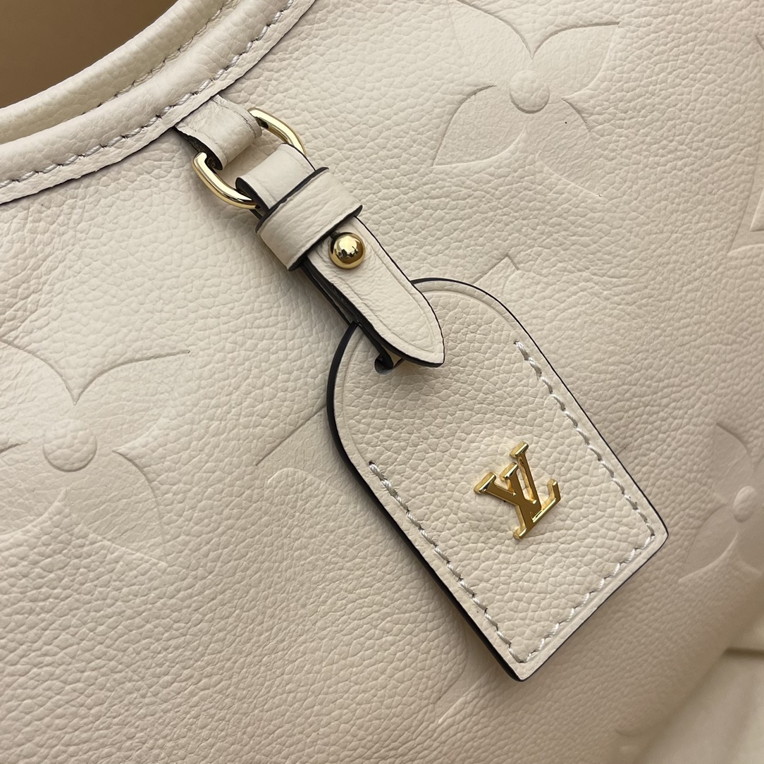 this small handbag features a generous silhouette with a well-organized - Bag 5