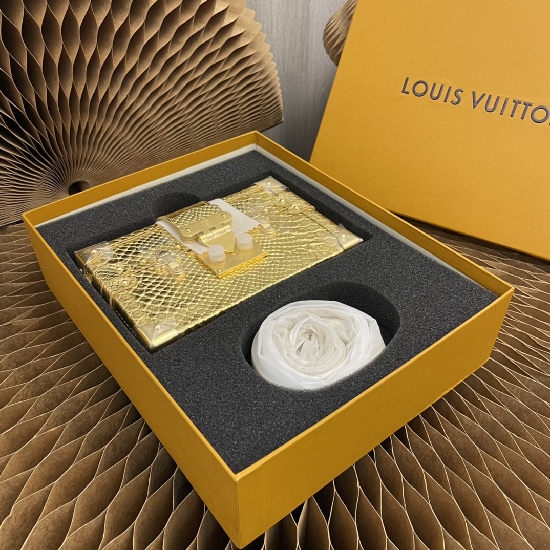 this Petite Malle handbag is crafted from luxurious python skin to - Bag 2