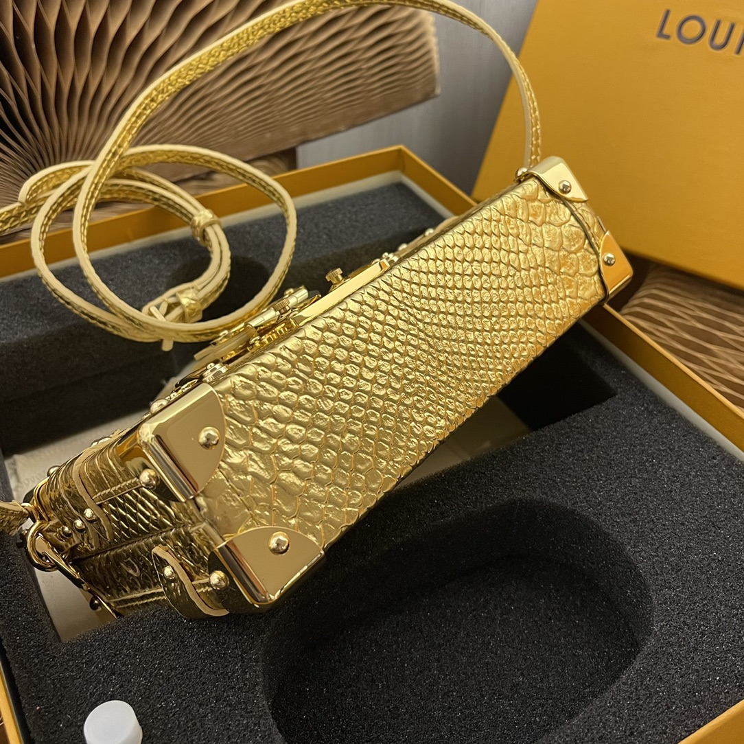 this Petite Malle handbag is crafted from luxurious python skin to - Bag 4