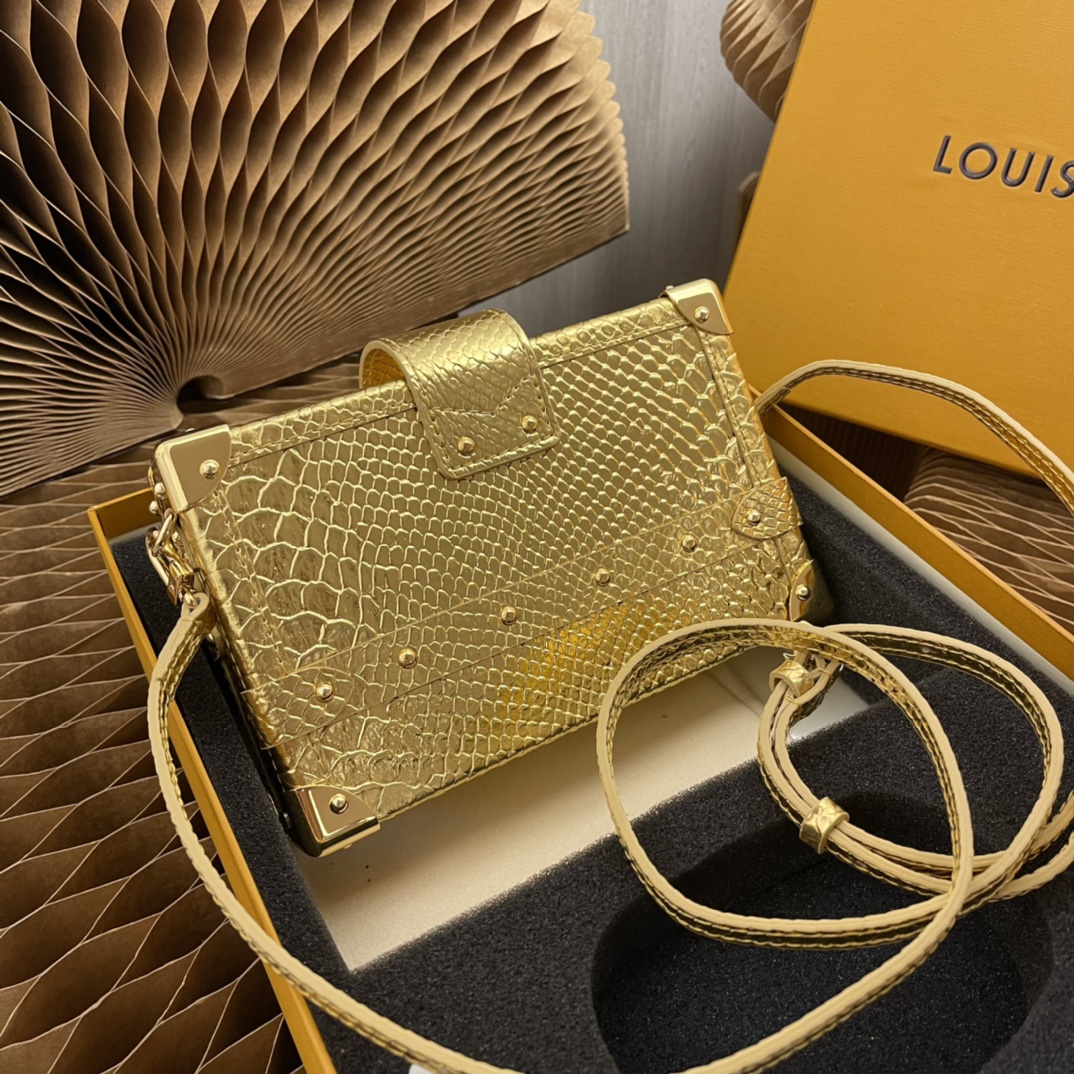 this Petite Malle handbag is crafted from luxurious python skin to - Bag 3