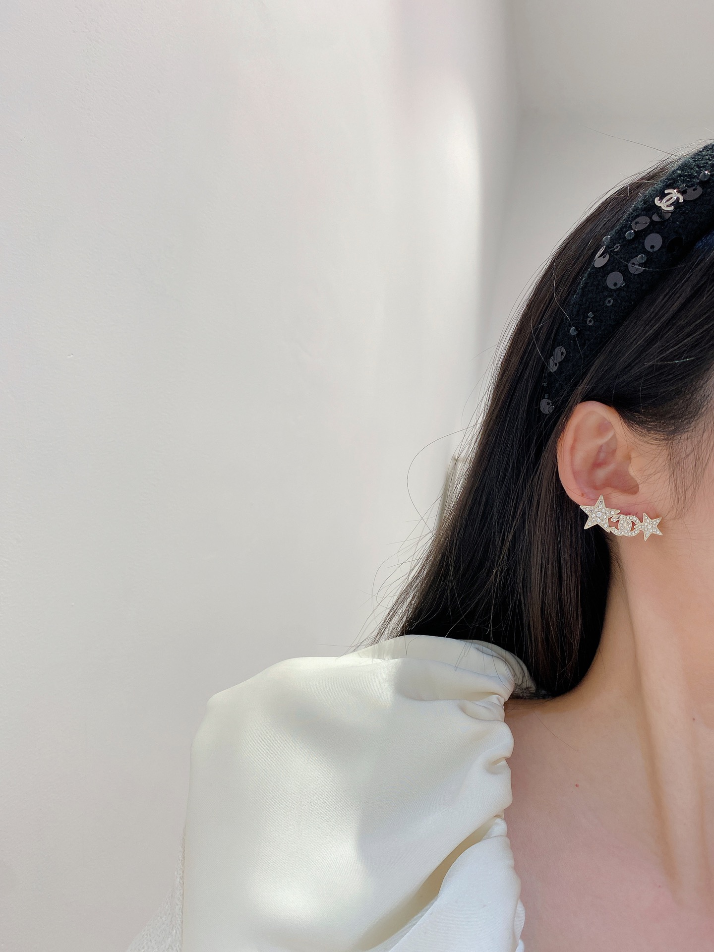 Boucles d'oreilles CHANEL étoile à cinq branches, arrangement de tailles, modèle long, modèle court