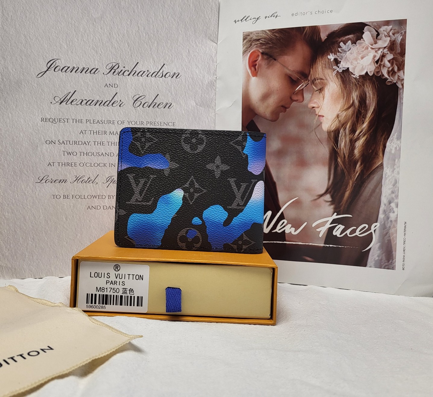 Leather bifold wallet open with cards